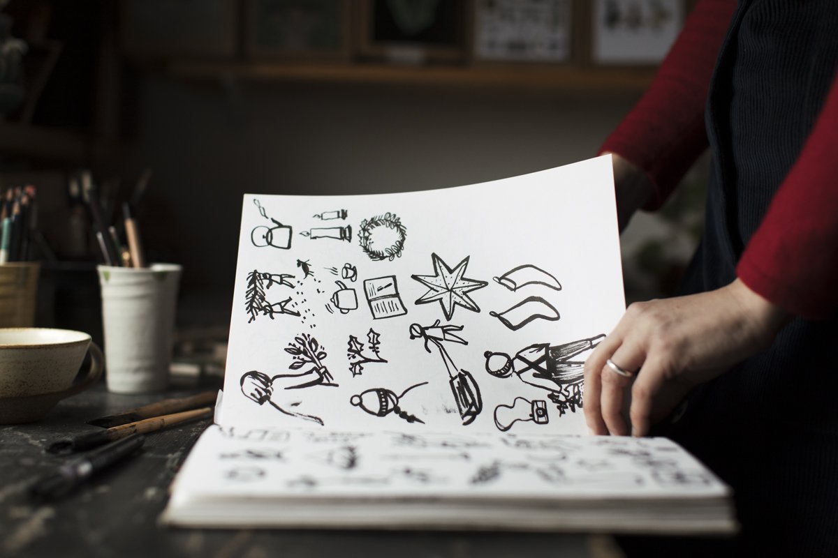 Illustrator Gemma Koomen in her studio drawing