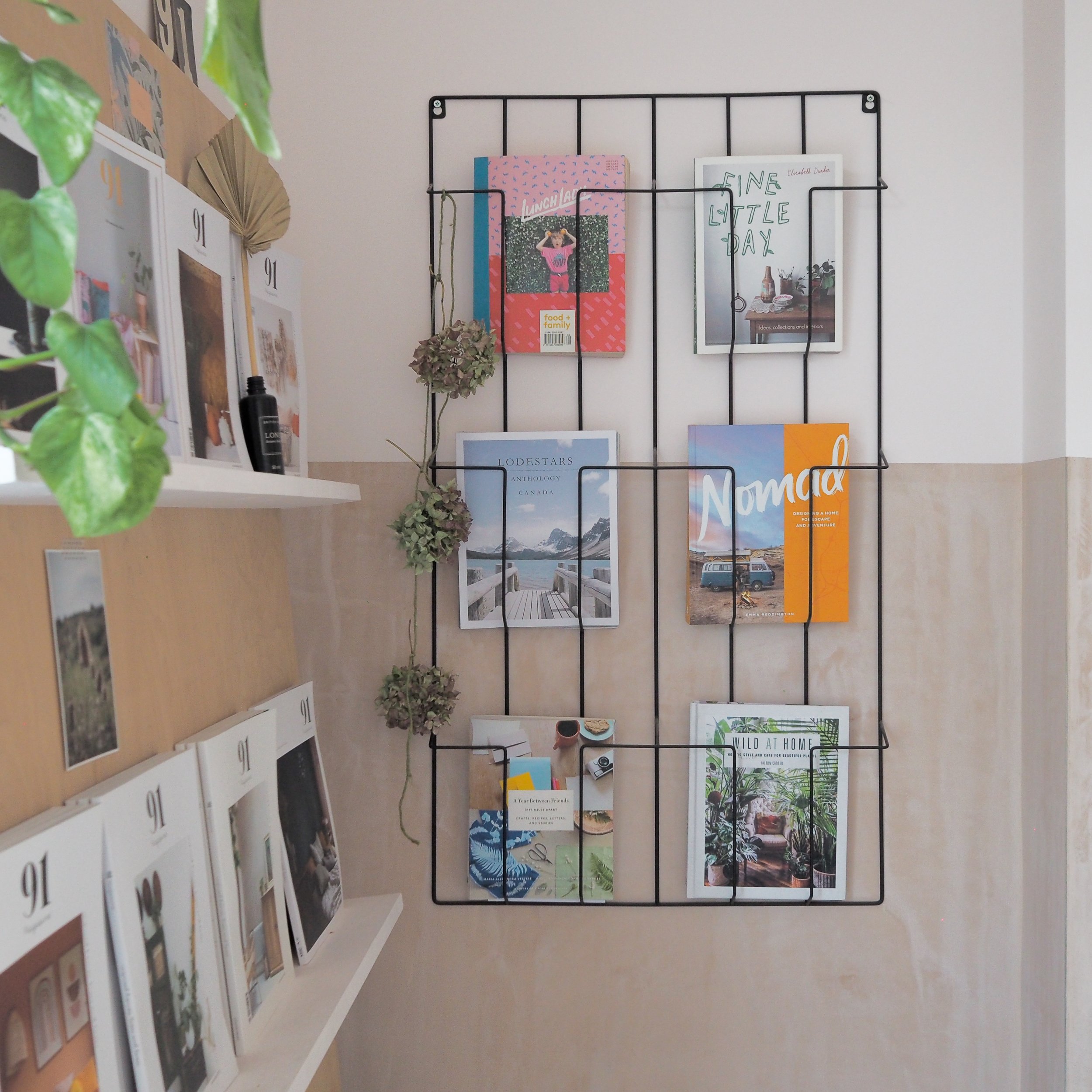 Magazines and books in a wall rack