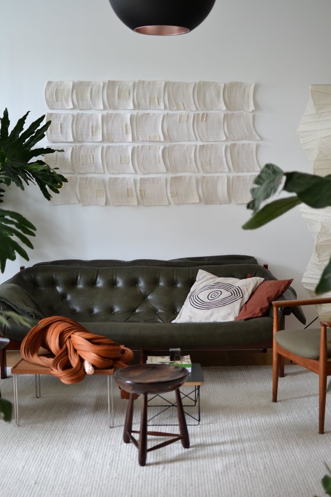 Happy Interior Blog's Igor Josifovic Kemper Berlin home with green leather sofa and plants