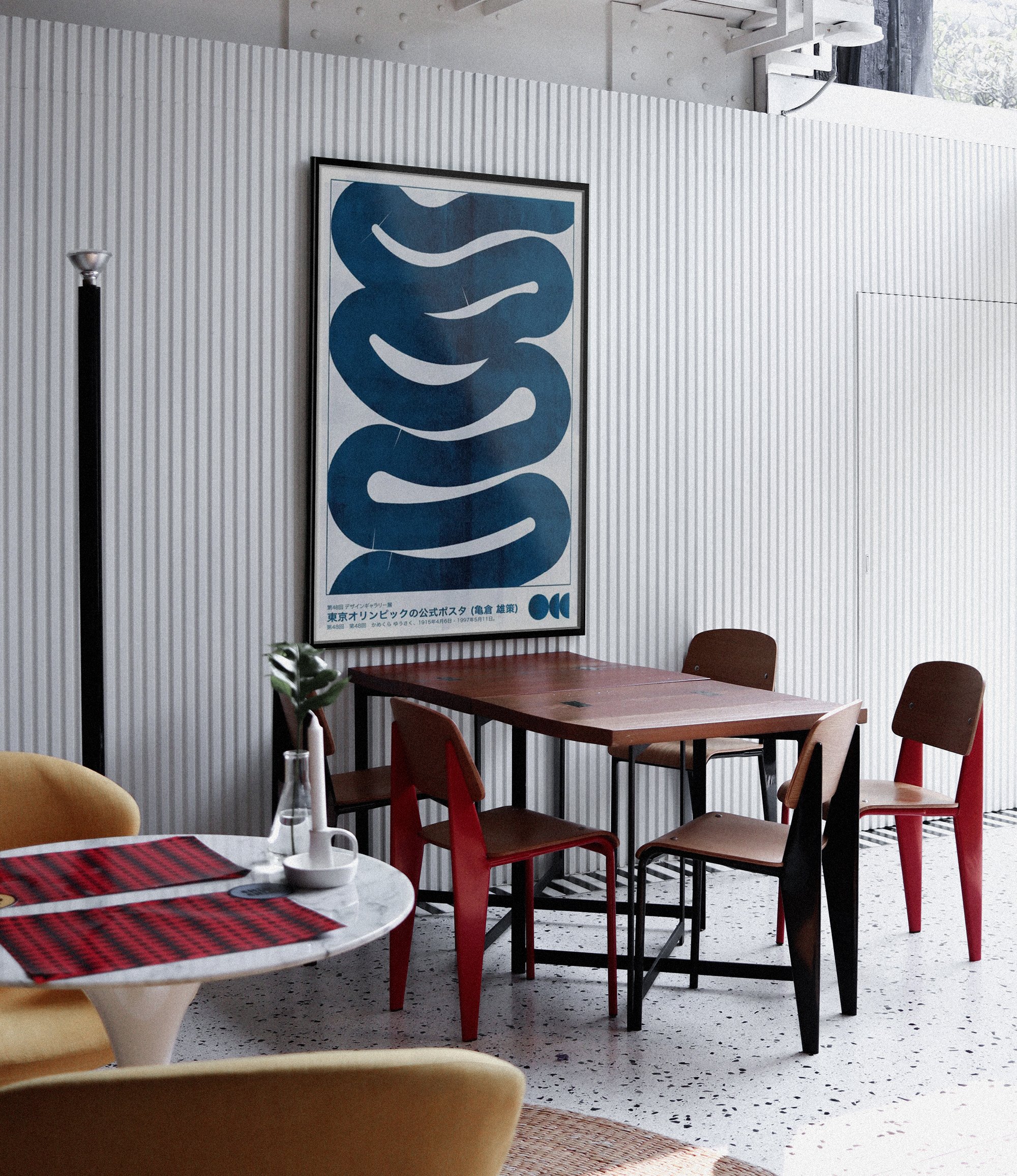 Dining area with large artwork on the wall