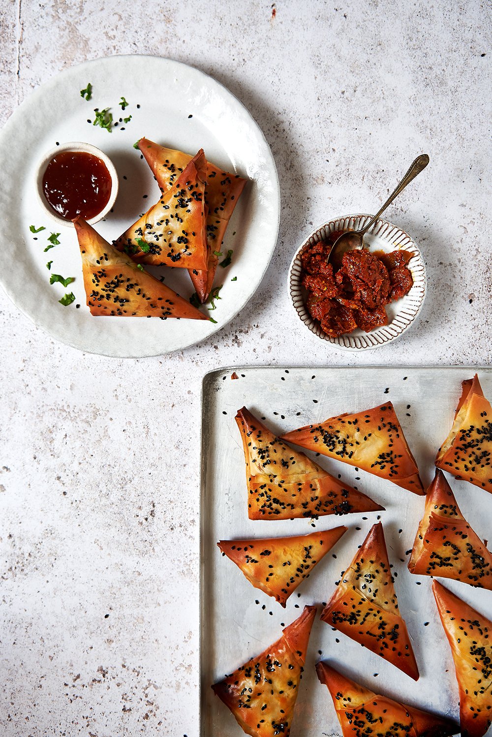 Baking tray and plate with samosas