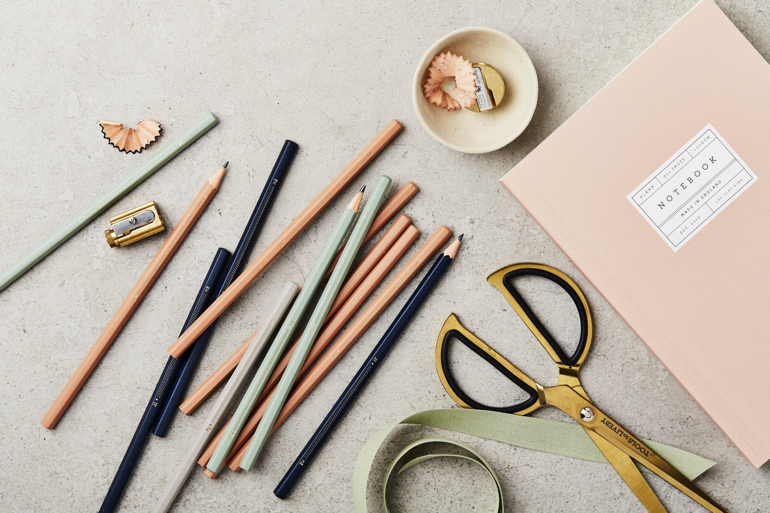 collection of pretty pencils and stationery on tabletop
