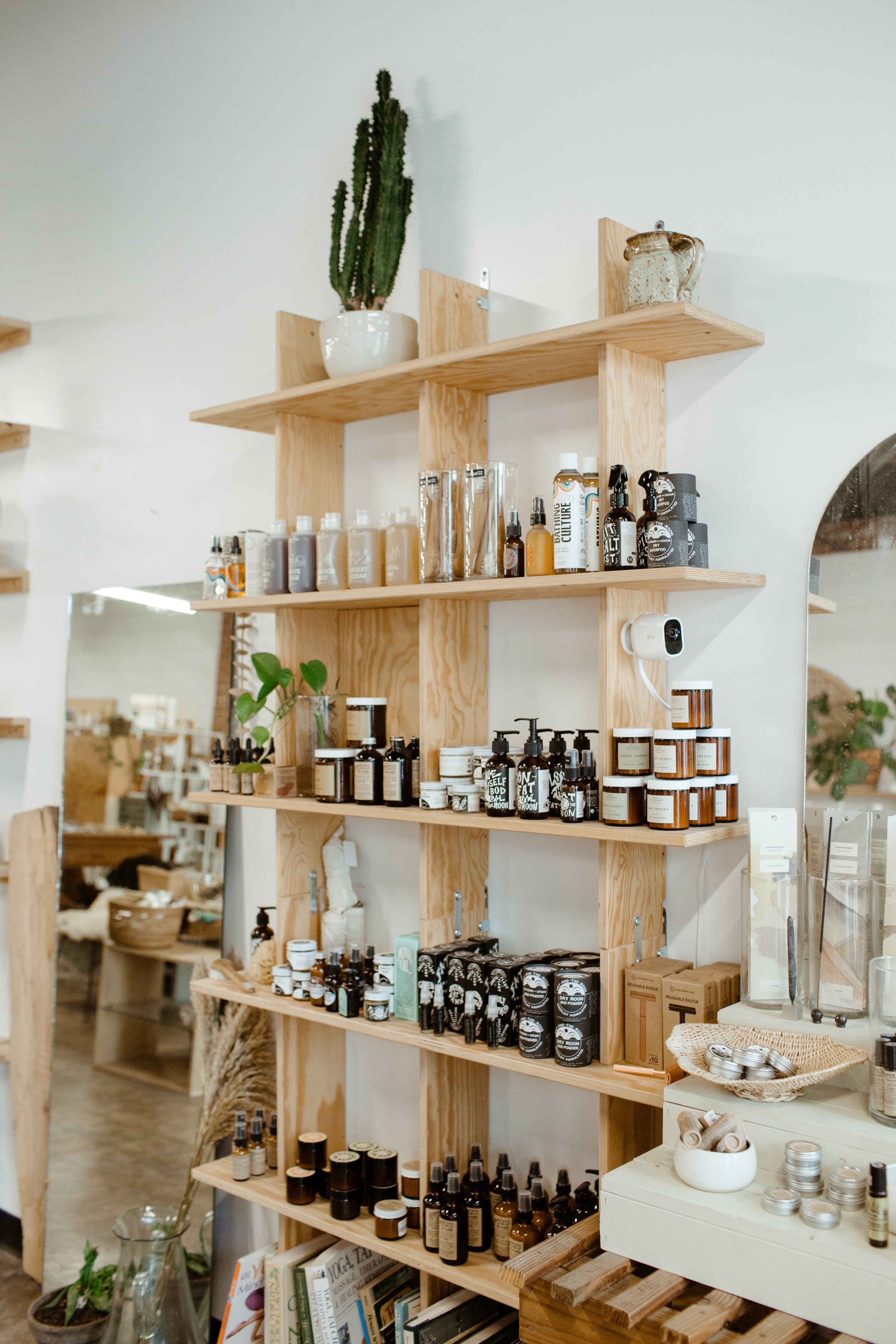 Shelving in a lifestyle store displaying beautiful skincare products
