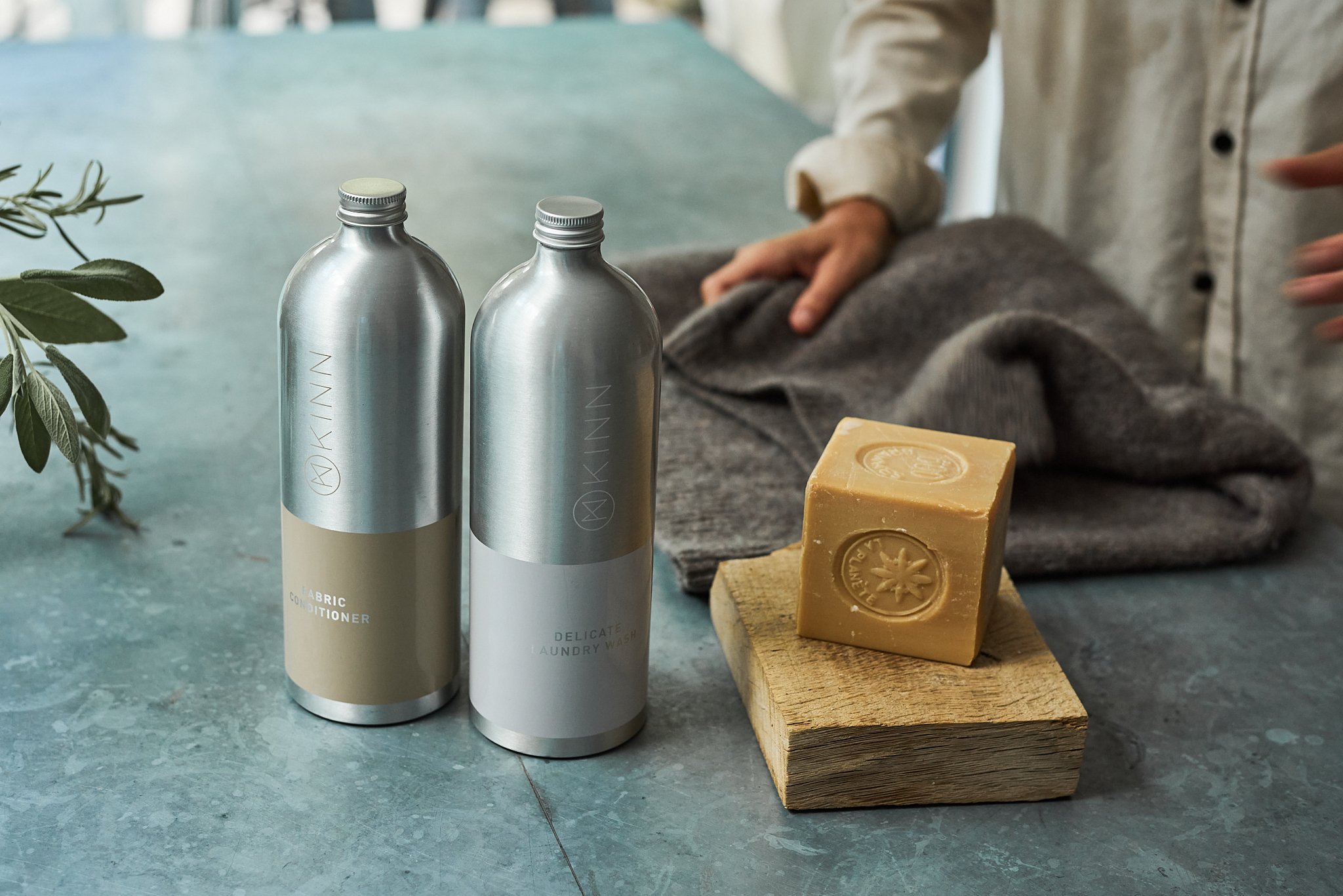 metal bottles of sustainable eco cleaning products by Kinn Living