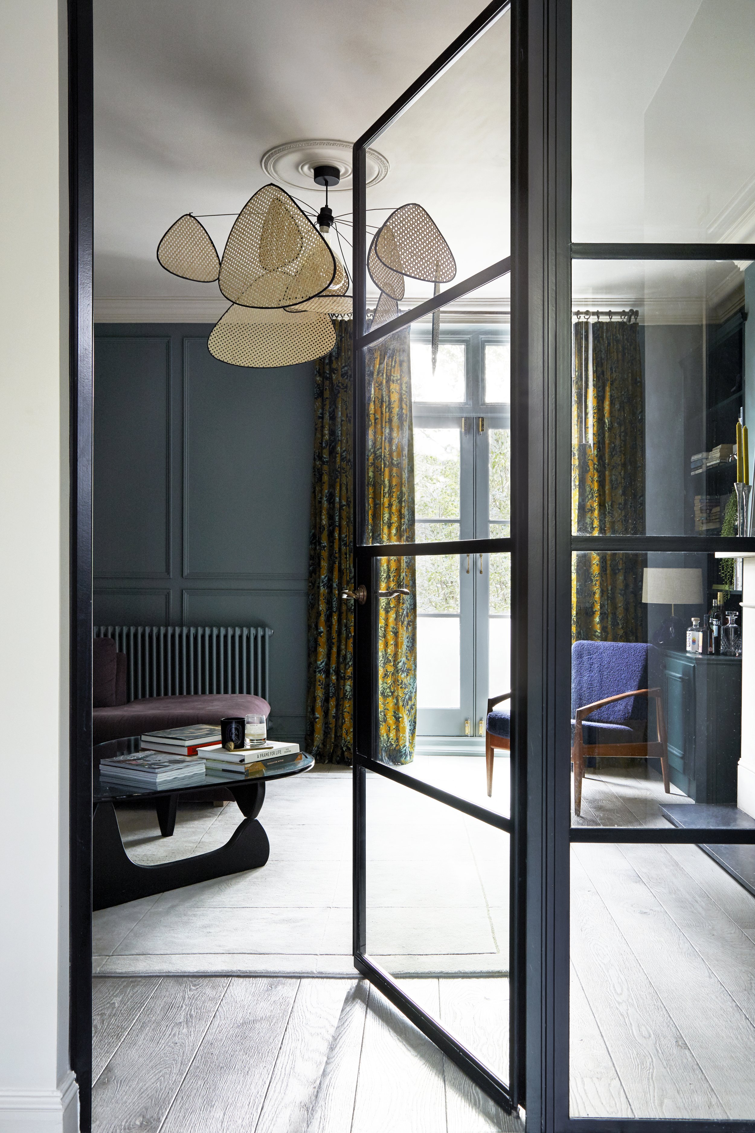 Glass divider for snug room by interior designer Andrew Griffiths of A NEW DAY