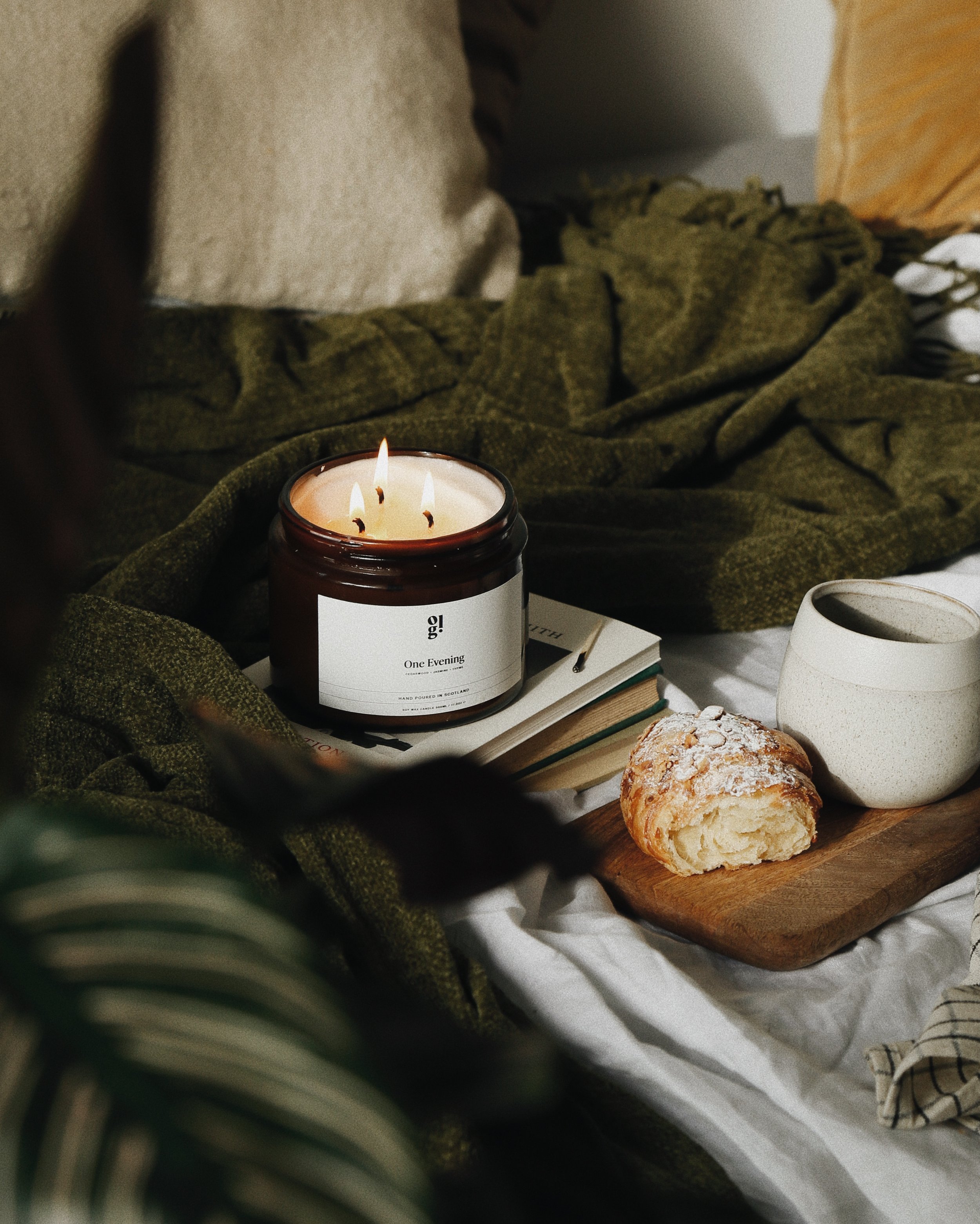 Our Lovely Goods candle in a cosy setting