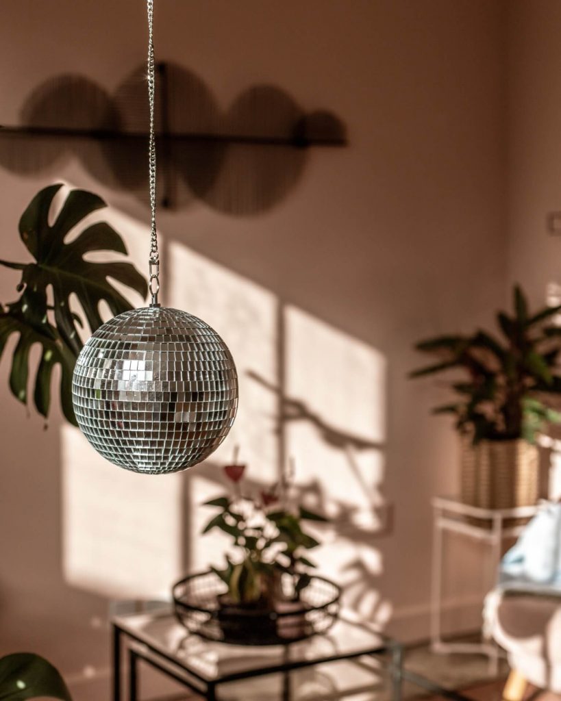 Disco ball and plants inside the Studio Cotton workspace