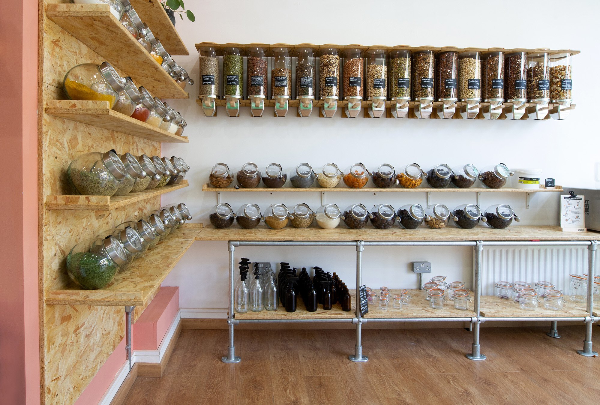 food jars and dispensers inside Jarr Market, a refill store in London