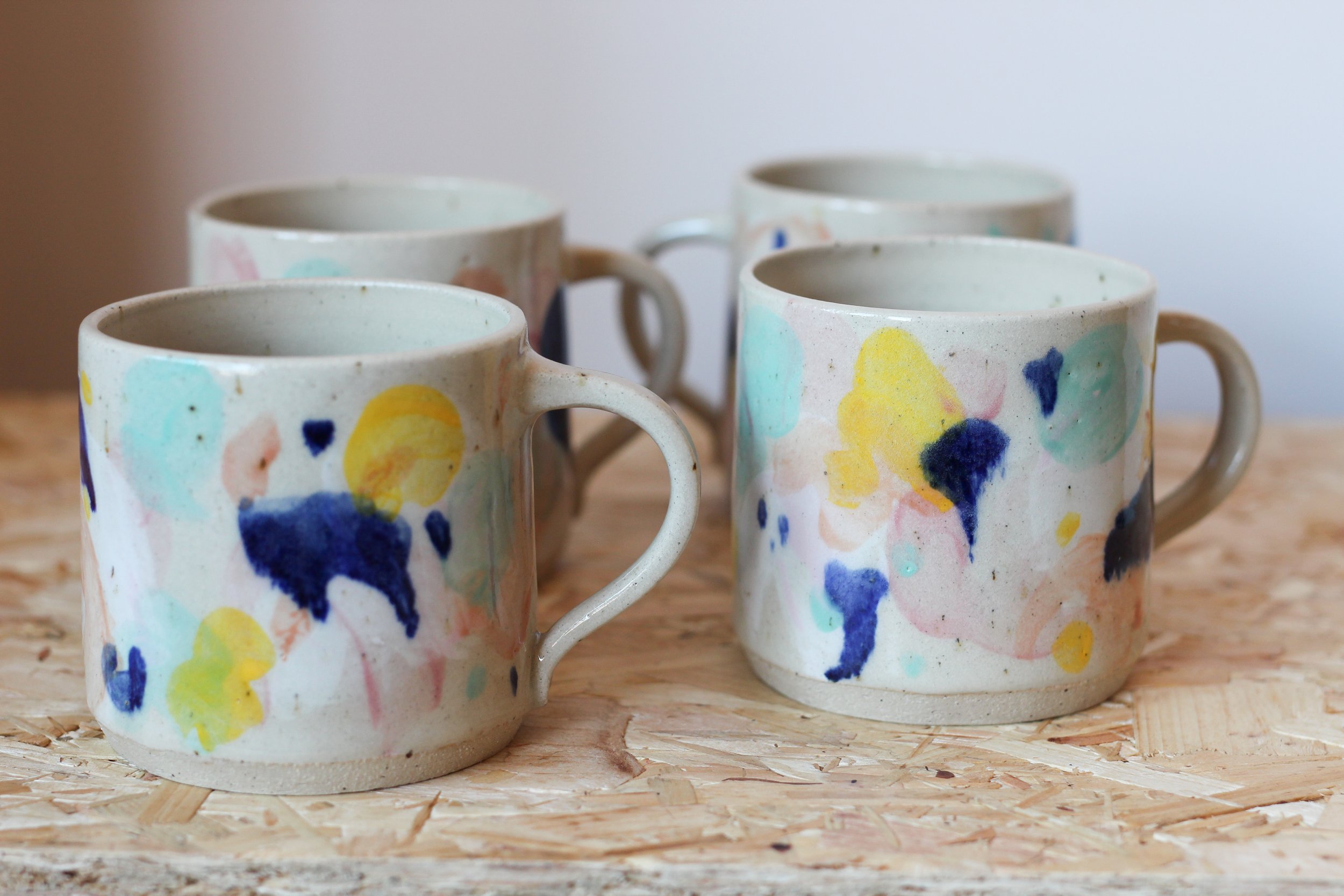 Colourful abstract ceramic cups inside the Scottish pottery studio of Glaswegian ceramicist Cath Maskell, Cath Pots
