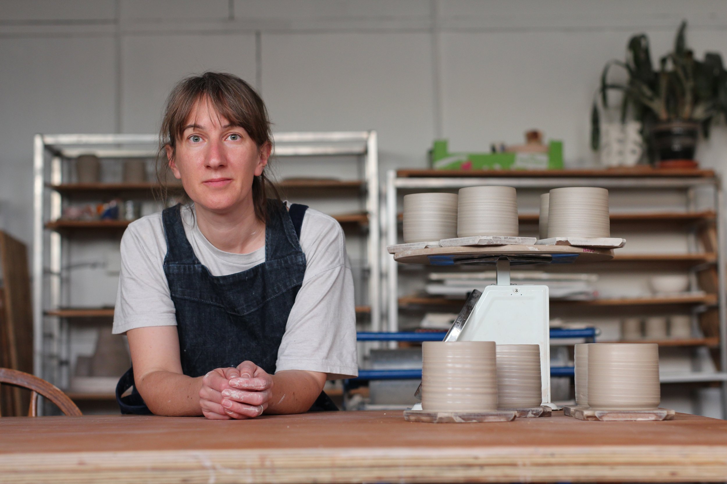 Cath Maskell potter AKA Cath Pots in her studio