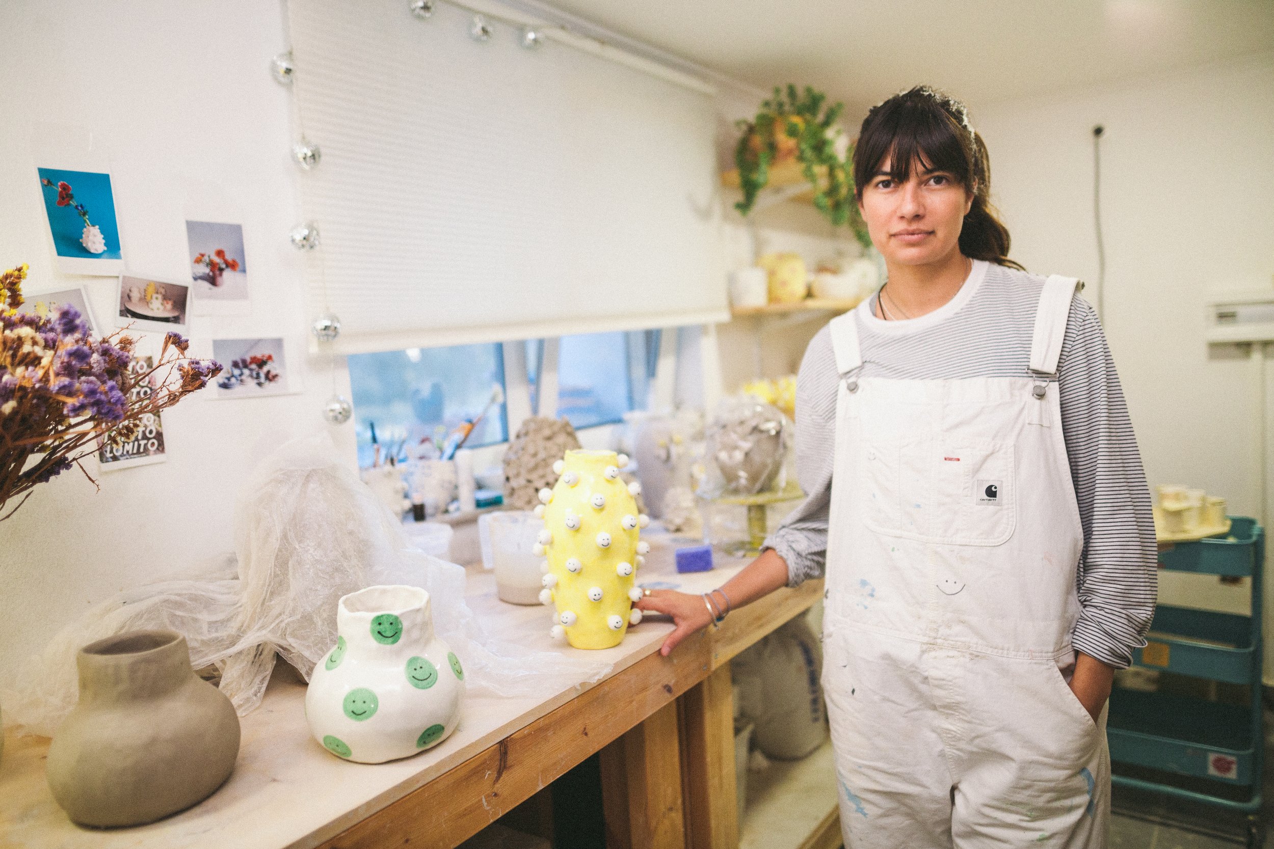 Ceramicist Margarita Mylona with some of her work in her studio