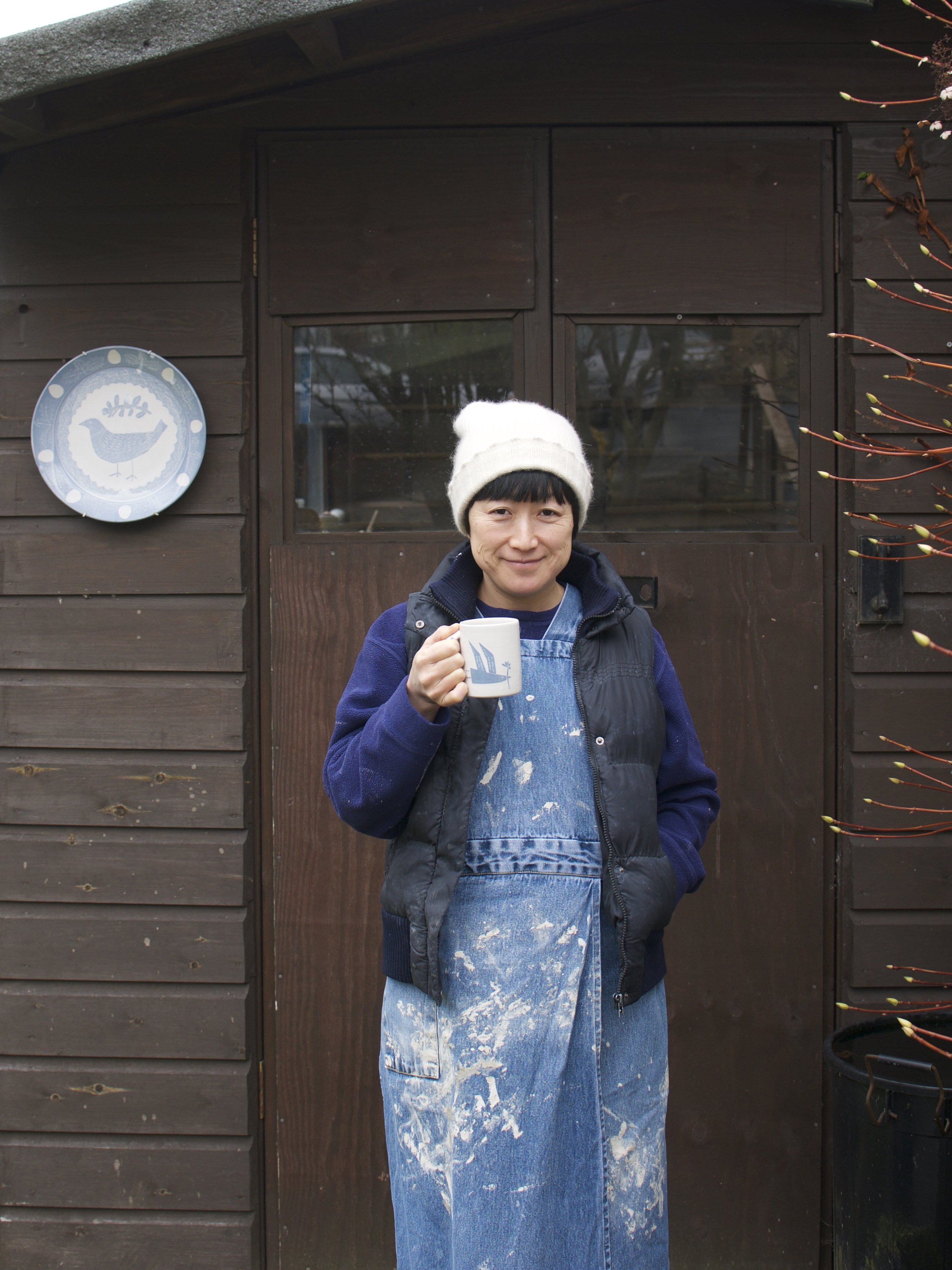 Ceramicist Makiko Hastings outside her studio