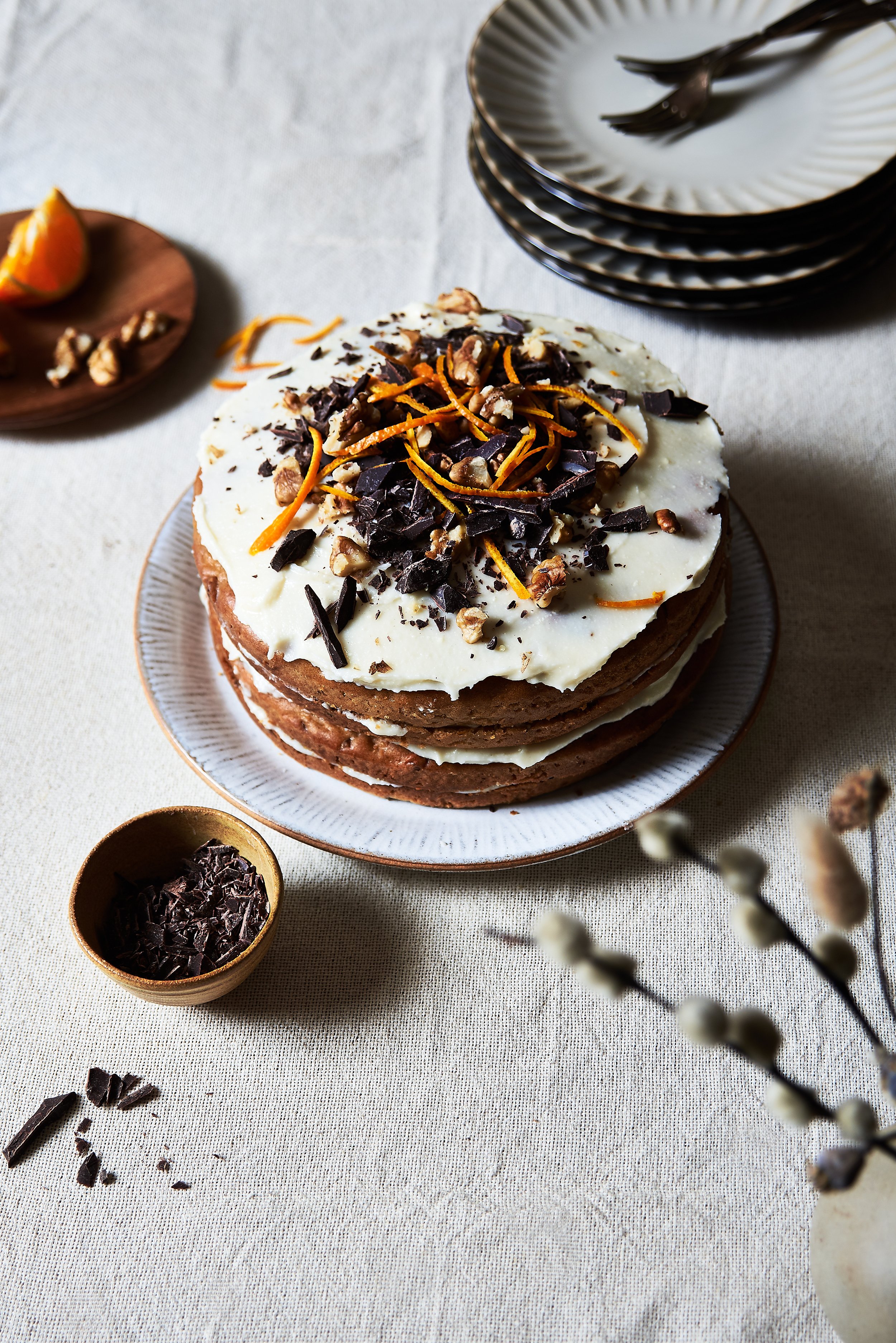 A beautifully decorated Carrot cake on a plate