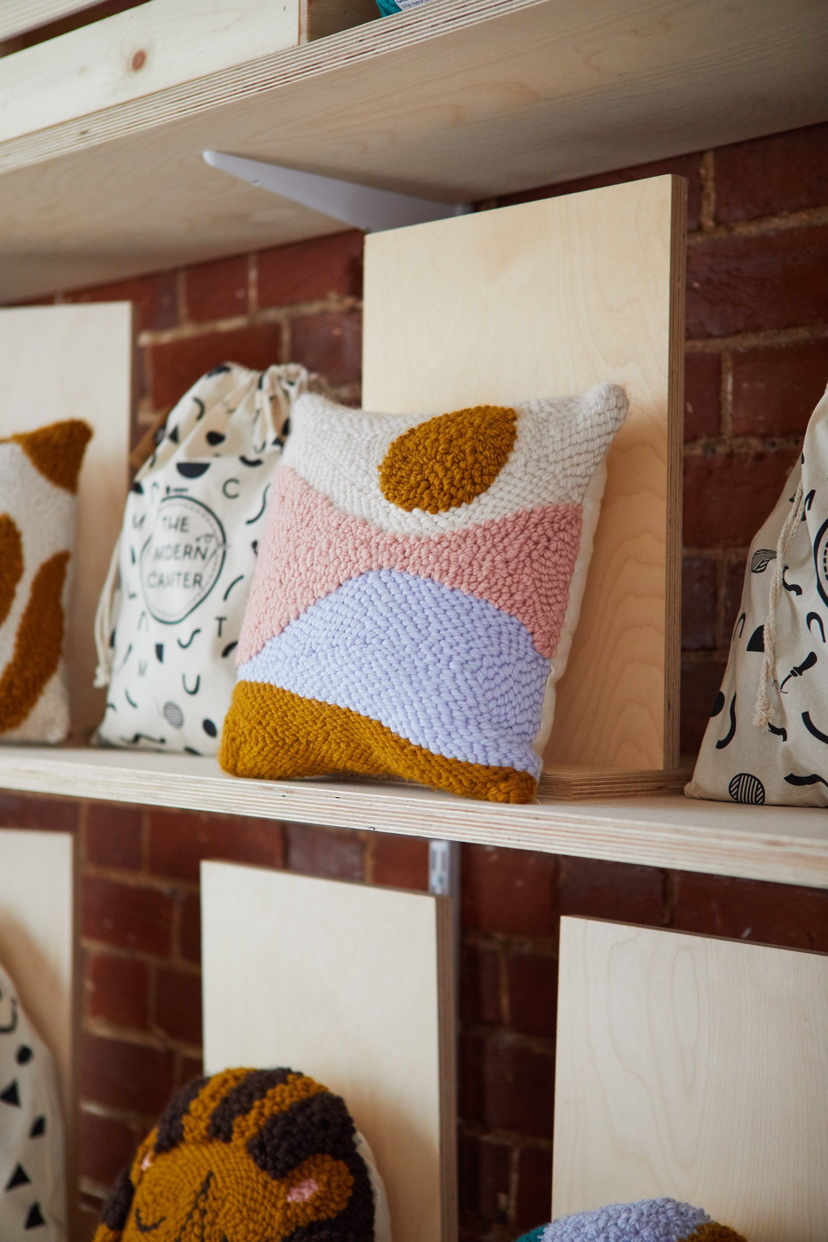 Stylish punch needle cushion in The Modern Crafter store in Saffron Walden