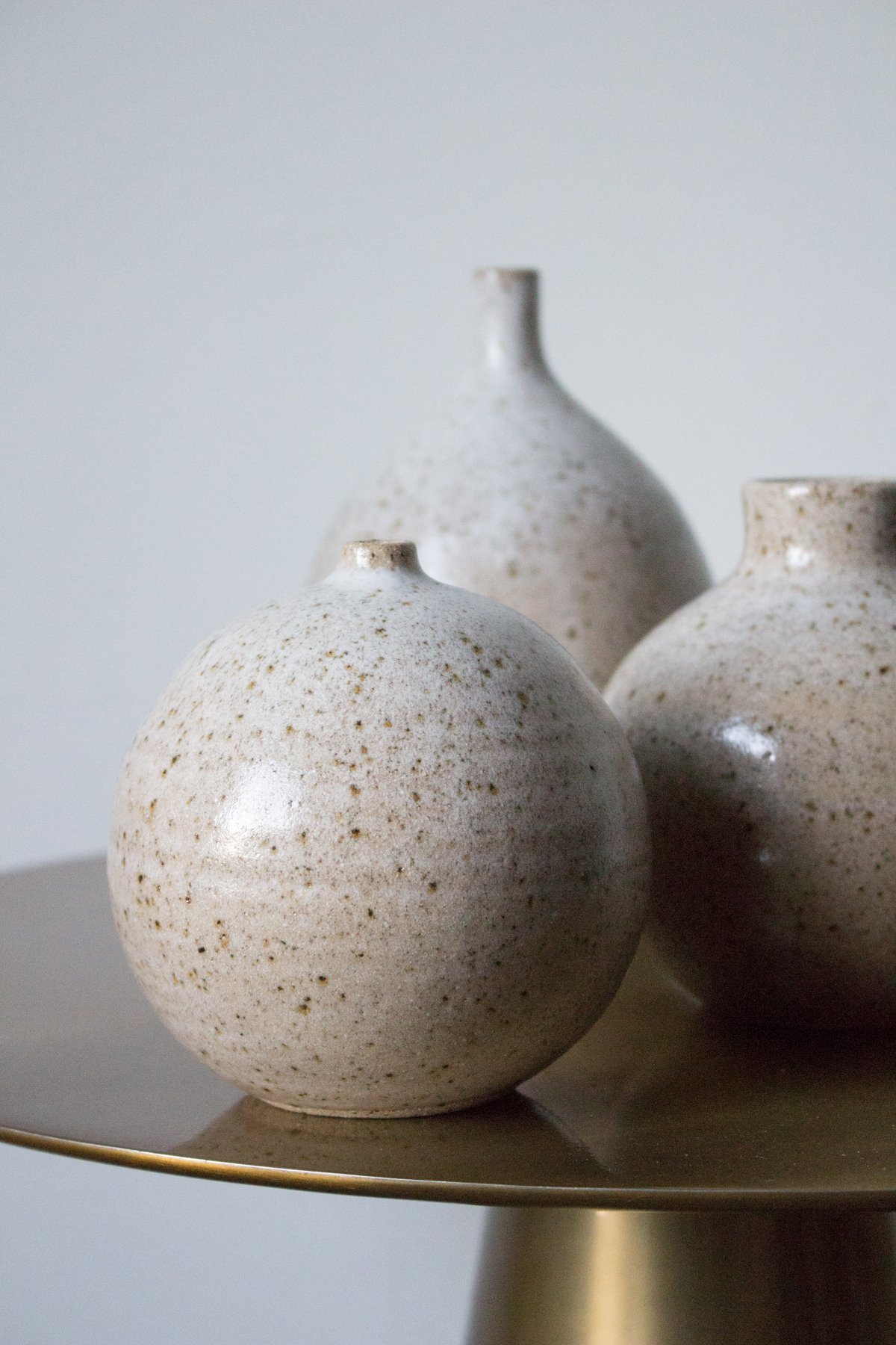 Speckled vases created by maker Katie Coston of Illyria Pottery