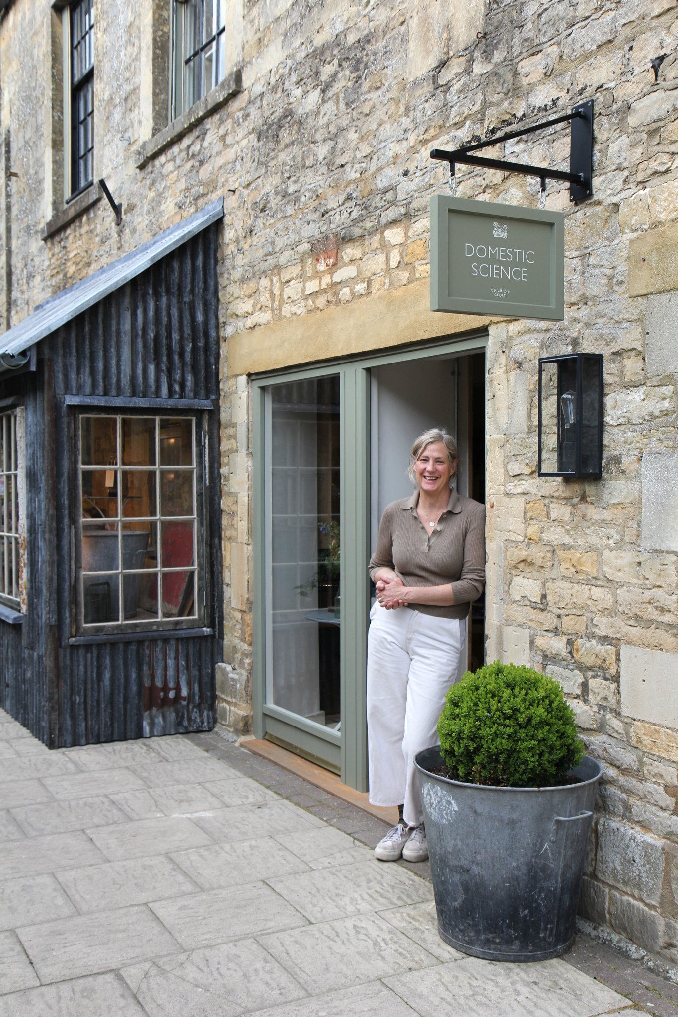 Domestic Science's owner Libs Lewis outside her vintage homeware store