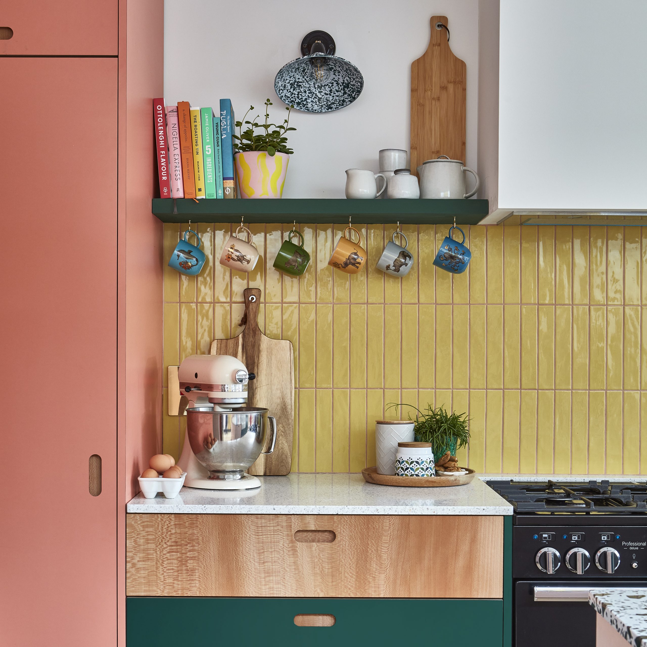 Pink, yellow and green kitchen by independent kitchen designers Pluck