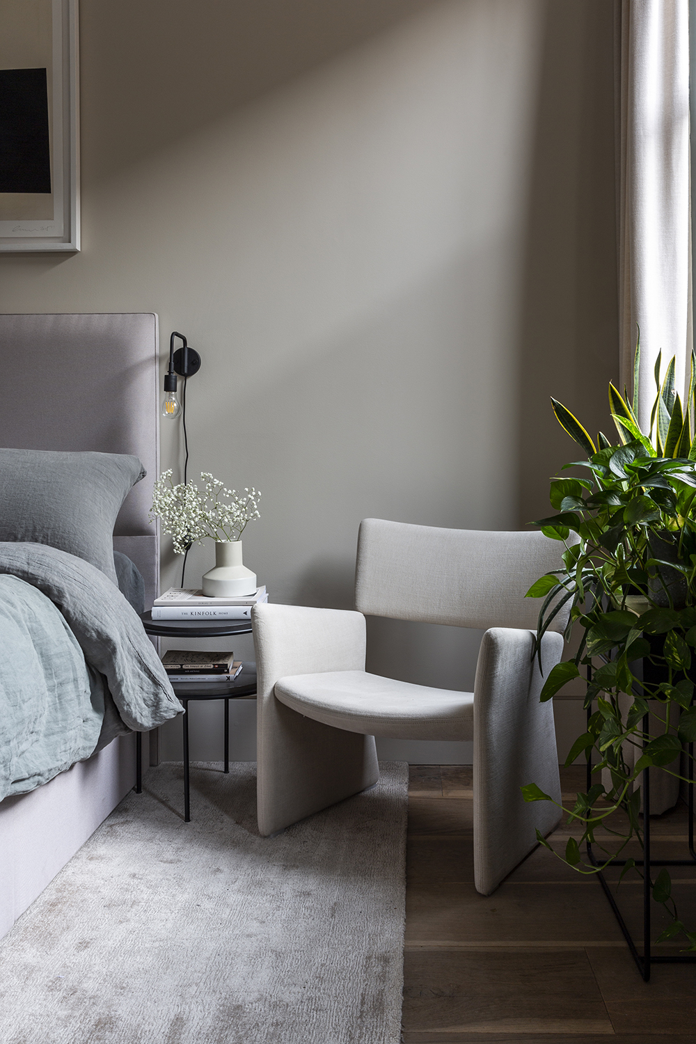 Minimal grey bedroom by interiors photographer Kasia Fiszer