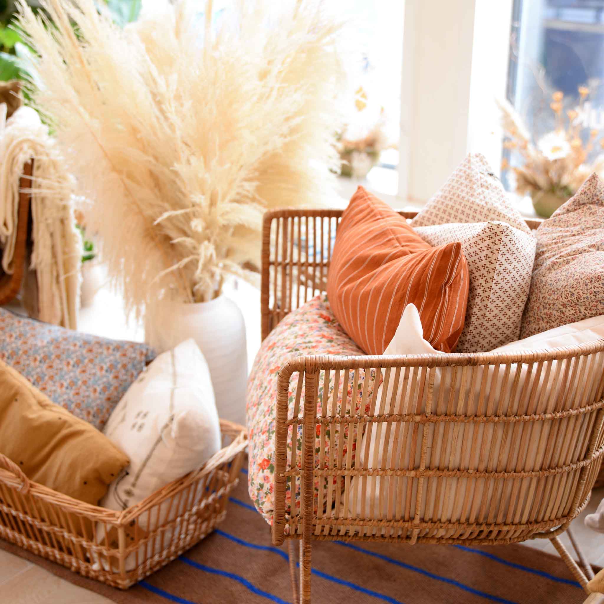Scandi wicker chair and home furnishings inside independent interiors store, Mon Pote Bristol