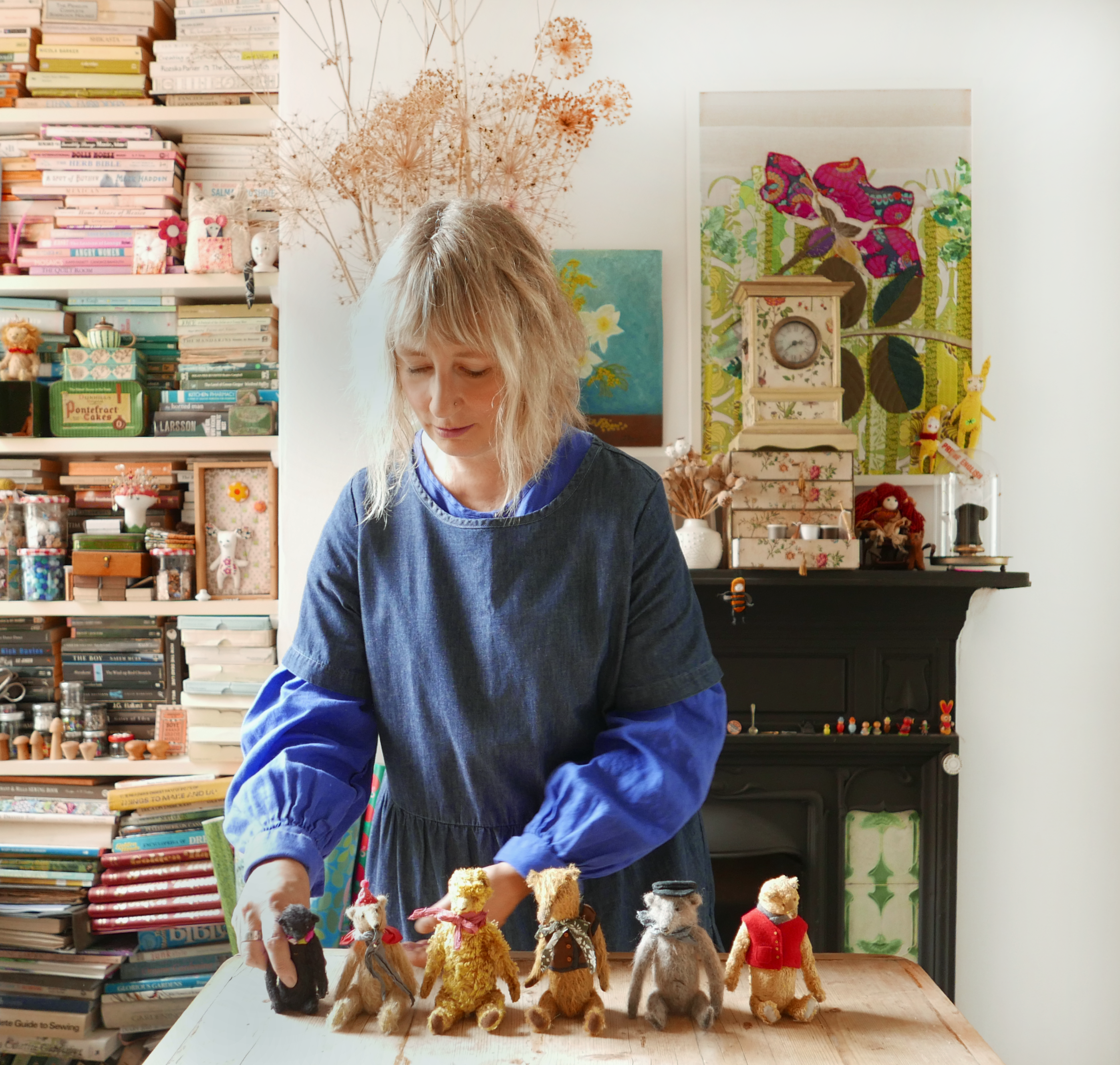 Sharon Everest of modflower lining up handmade teddy bears in her home studio