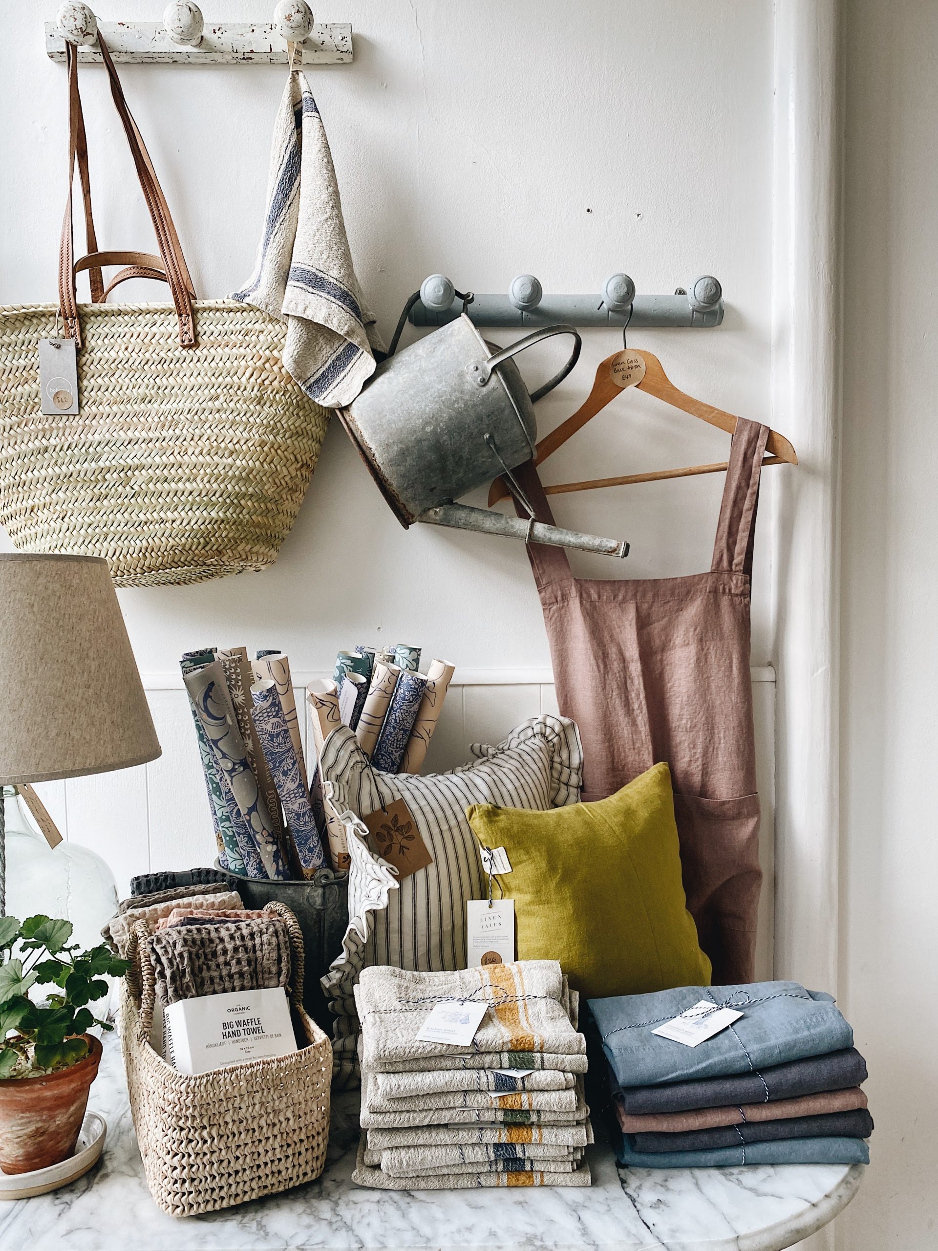 Linen dungarees and more inside The Botanical Candle Co. in Shaftesbury, Dorset