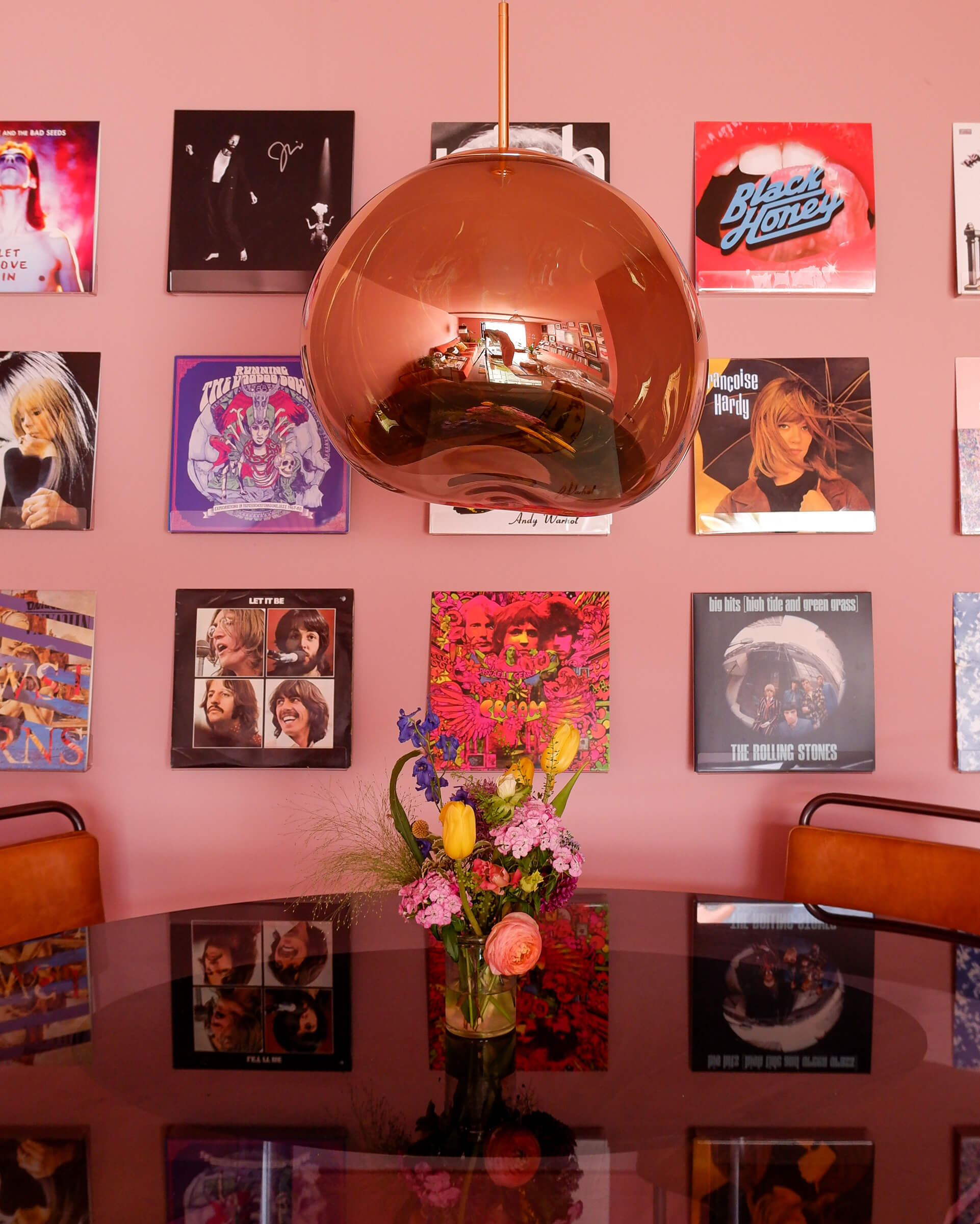 Inside Emma Jane Palin's pink retro living room with gallery wall record collection