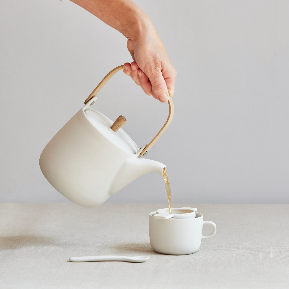 Minimal white teapot by British ceramist Sue Pyrke