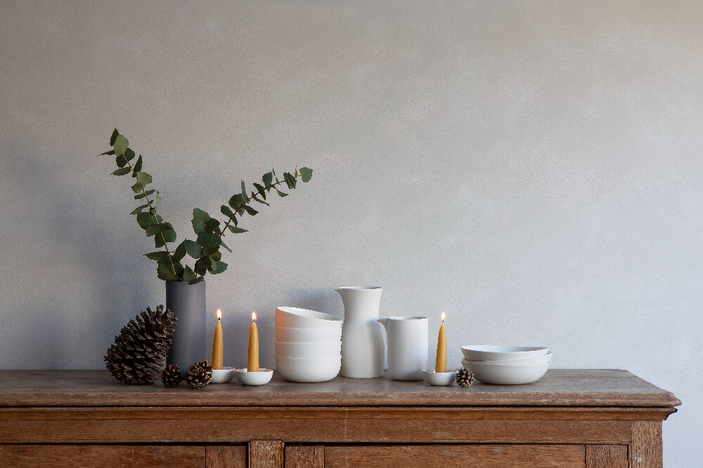 Minimal white mugs and jugs by British ceramist Sue Pyrke
