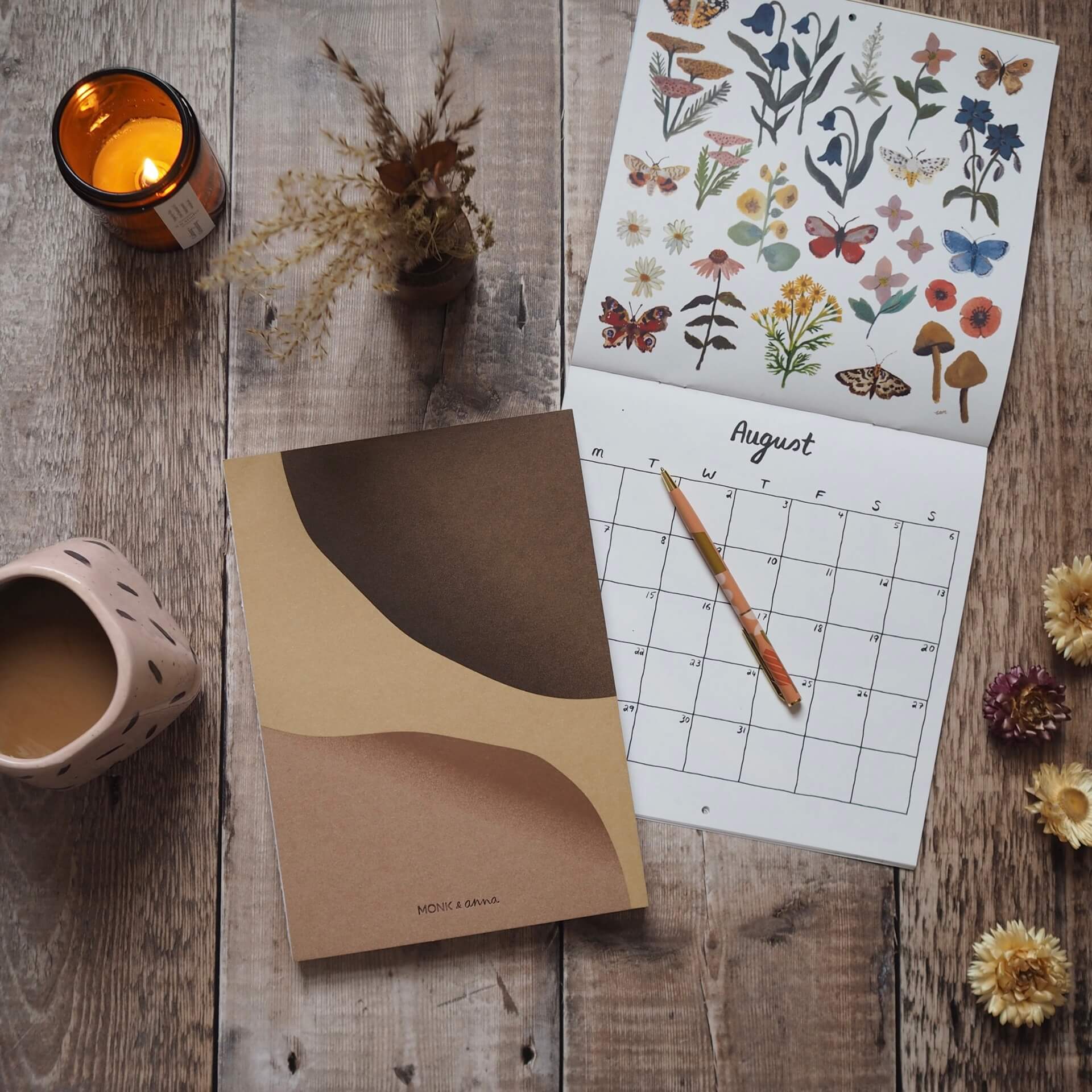 Email marketing tips from 91 Magazine - planning flatlay, with notebook and pen and calendar. 