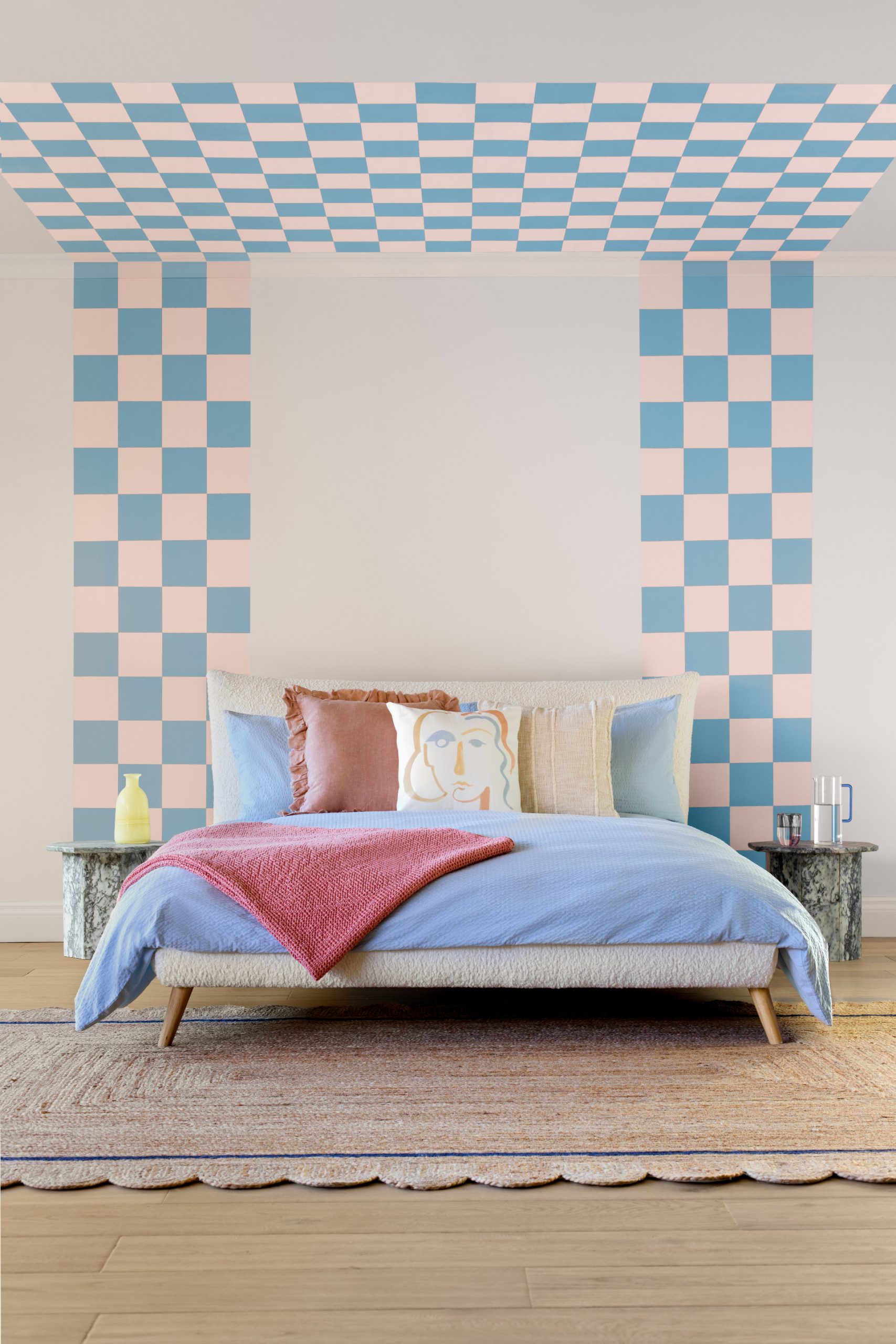 Statement blue checkered bedroom feature wall using blue paint from UK paint company YesColours