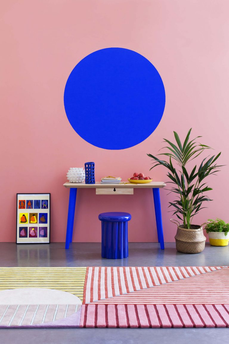 Pink modern wall paint by yescolours with blue circle and accessories