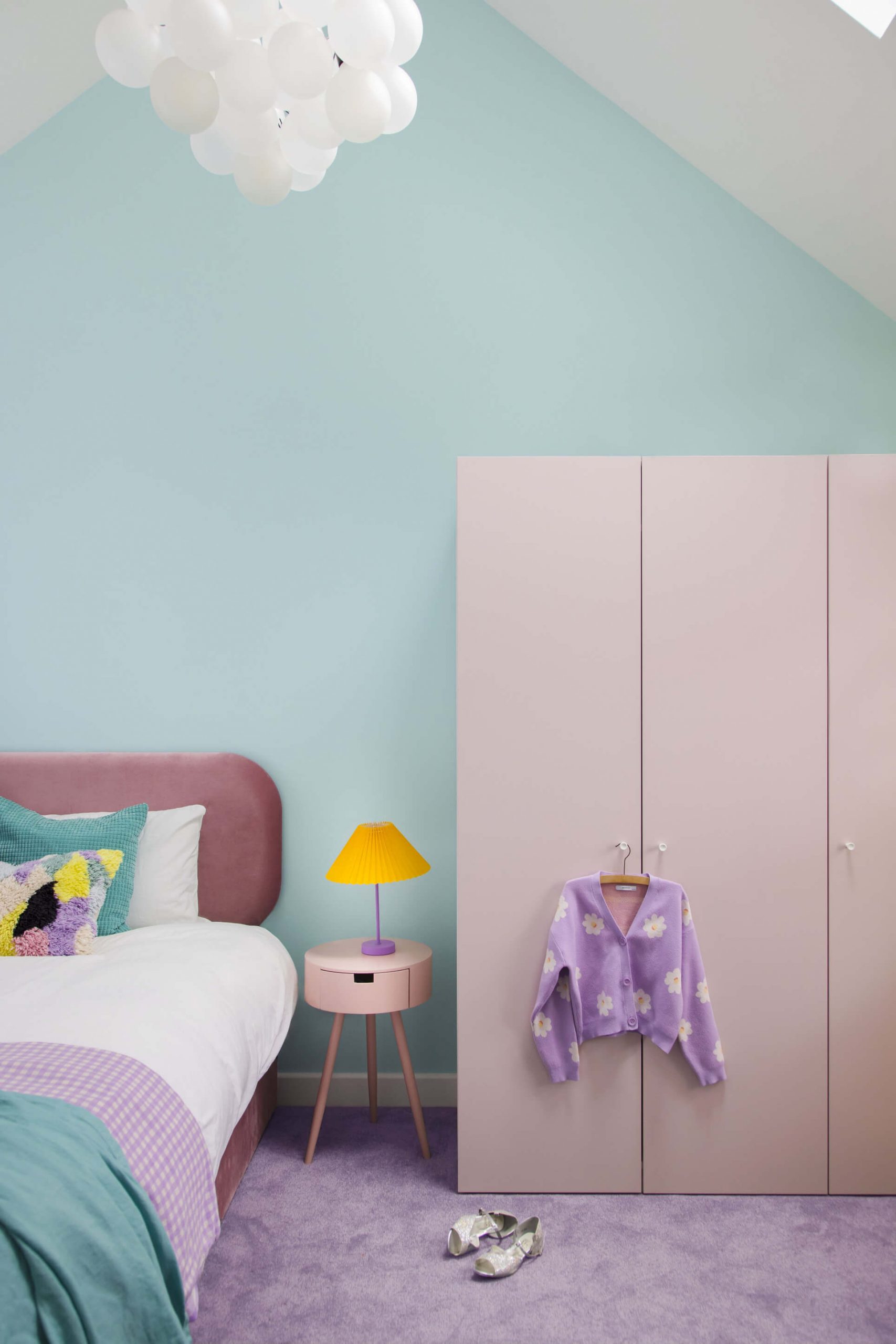 Pastel blue, lilac and yellow modern bedroom using UK paint company YesColours