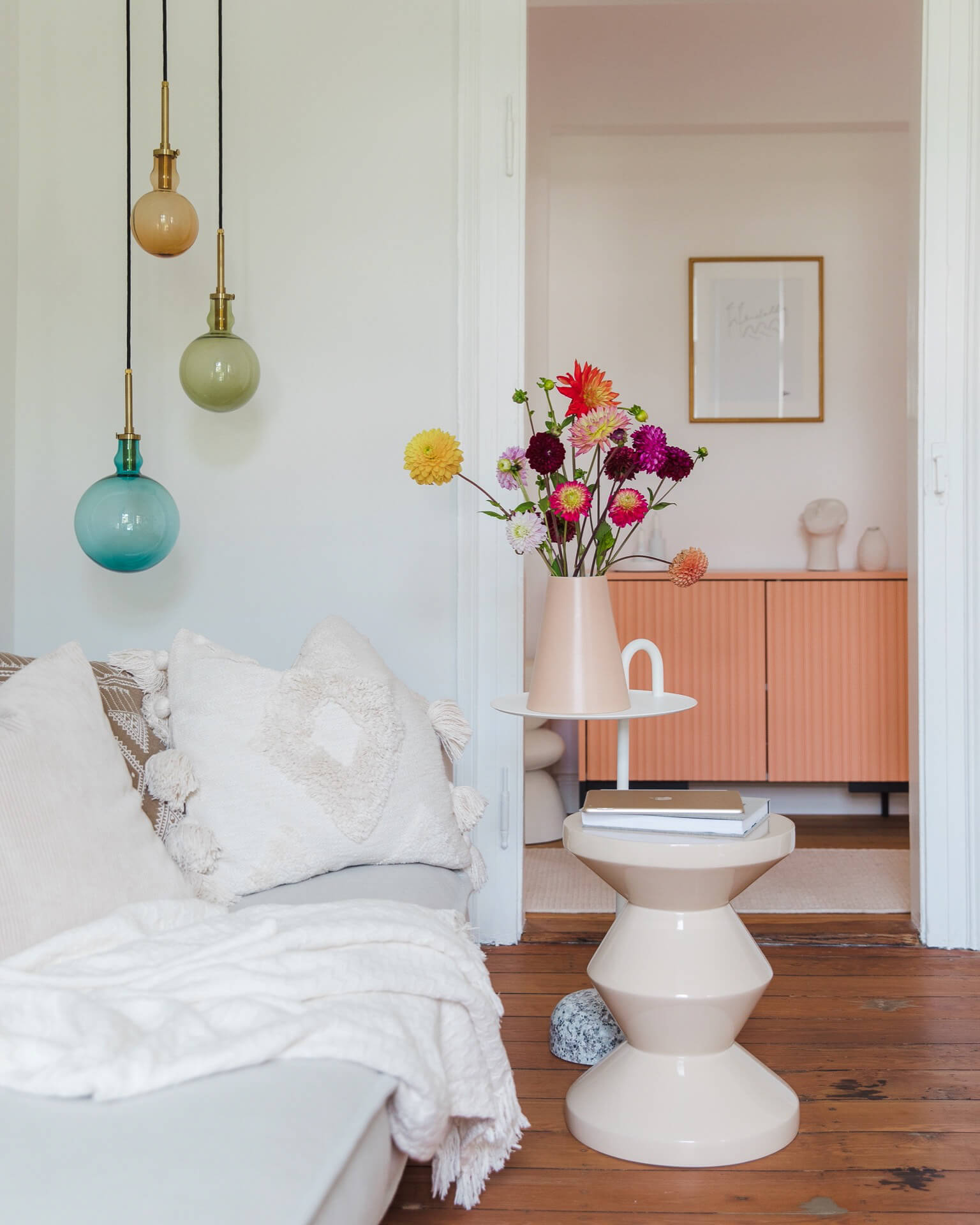 white living room with pops of colour by Instagrammers Danilo and Paolo of @homeinheidelberg home tour