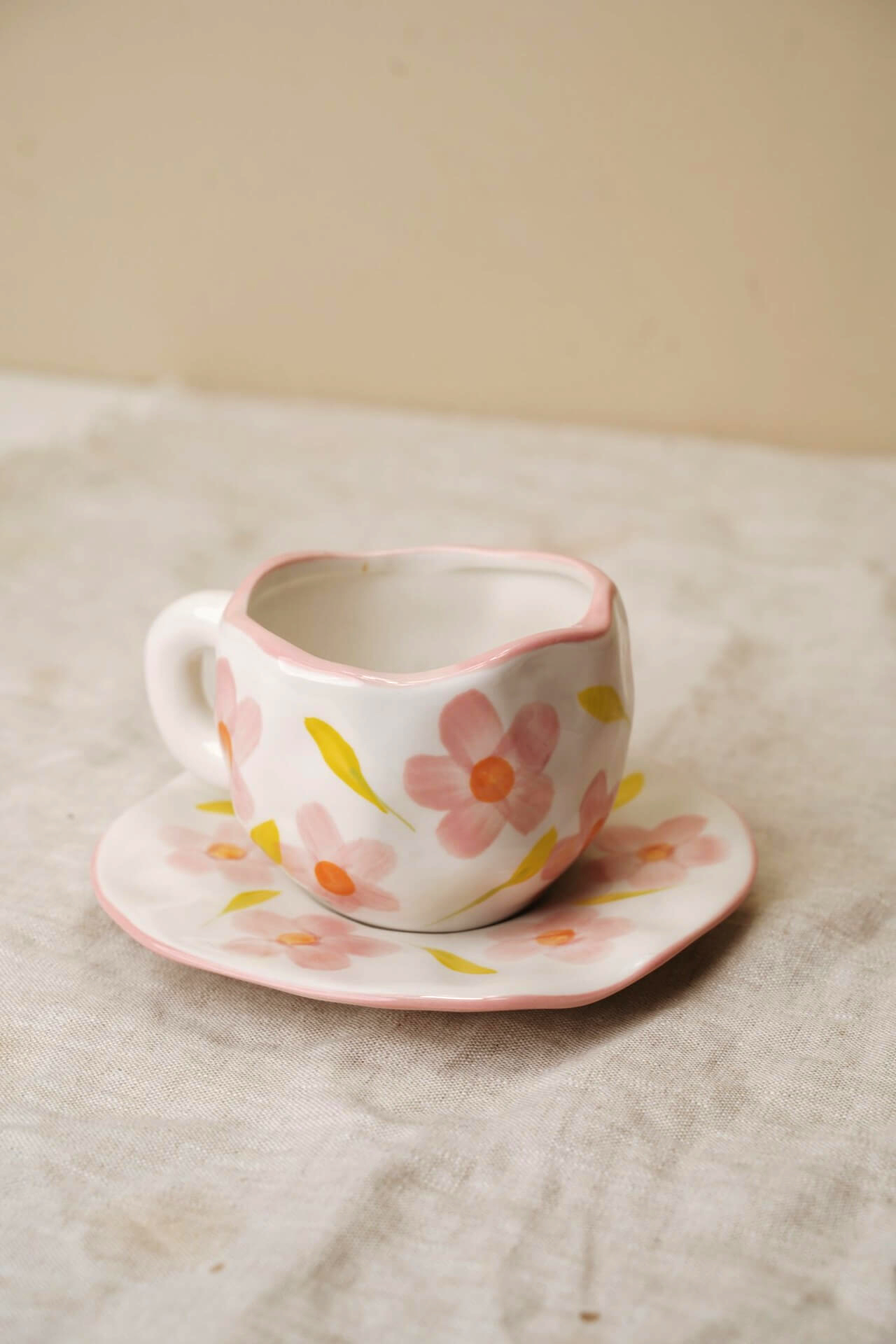small ceramic espresso cup with floral design