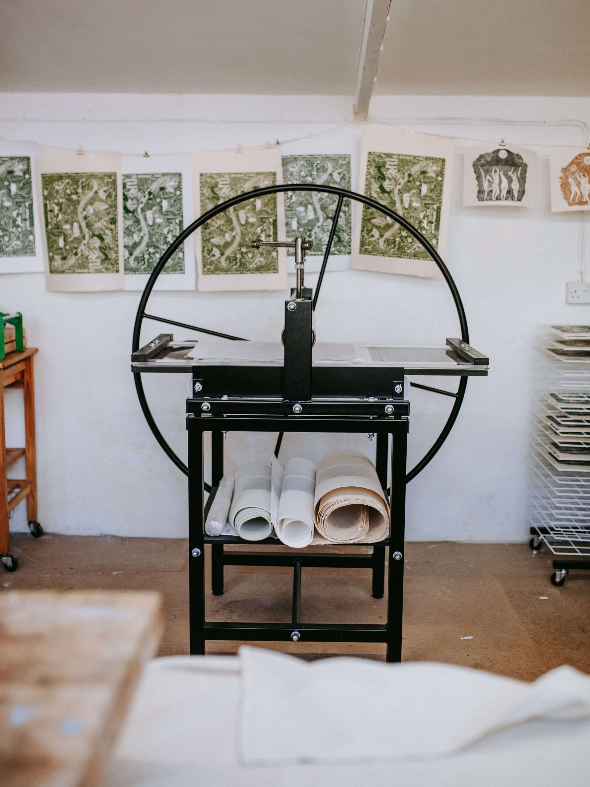 Nicole Purdie of Prints By The Bay linoprinting in her Dorset studio