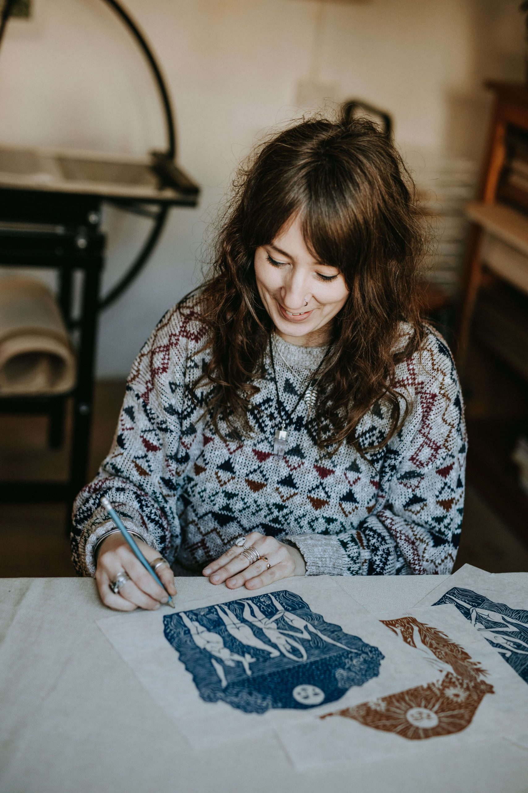 Nicole Purdie of Prints By The Bay linoprinting in her Dorset studio