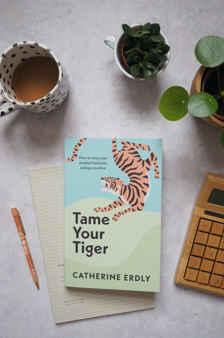 Small business book Tame Your Tiger: How to stop your product business eating you alive by Catherine Erdly on a table