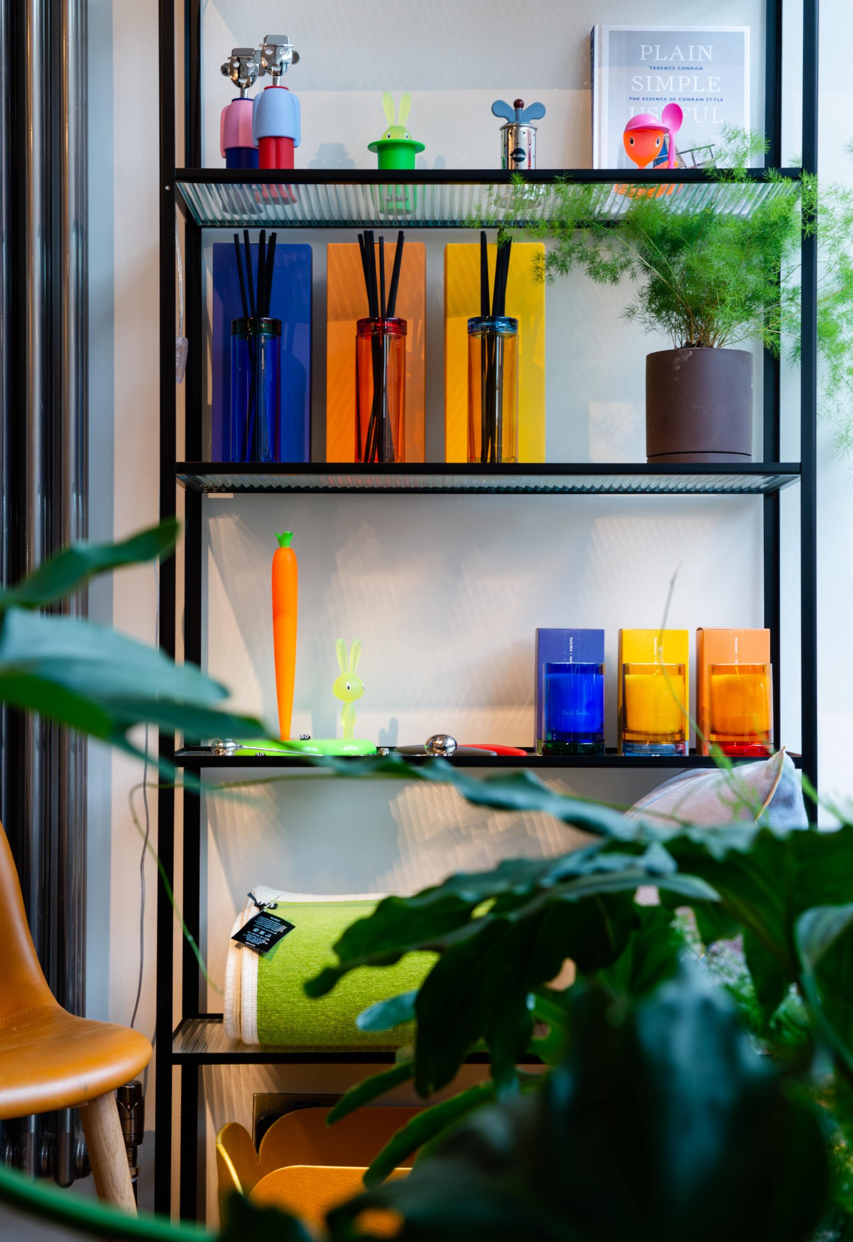 Colourful diffusers and candles inside independent interior store HOOS Glasgow