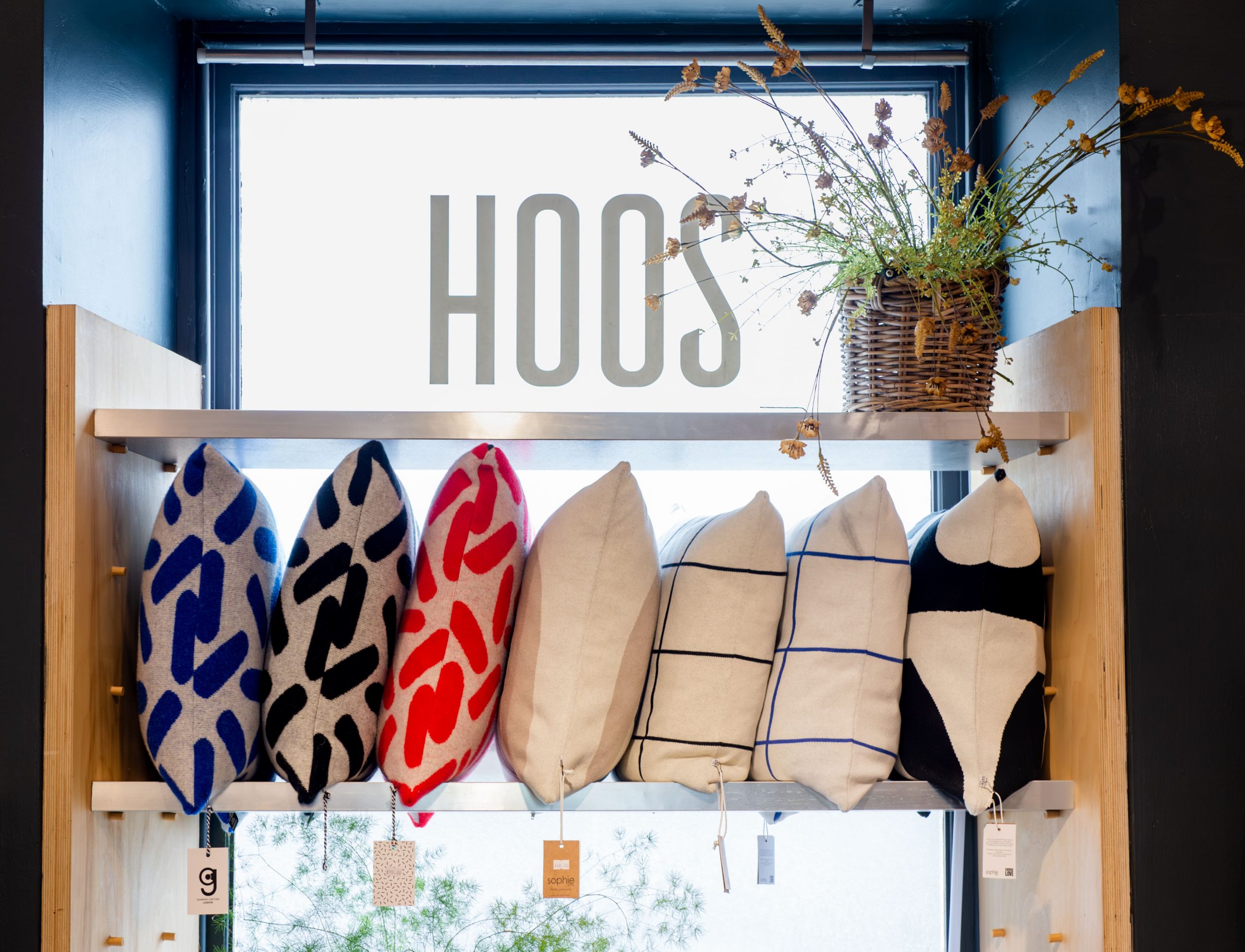 Colourful block print cushions inside independent interior store HOOS glasgow