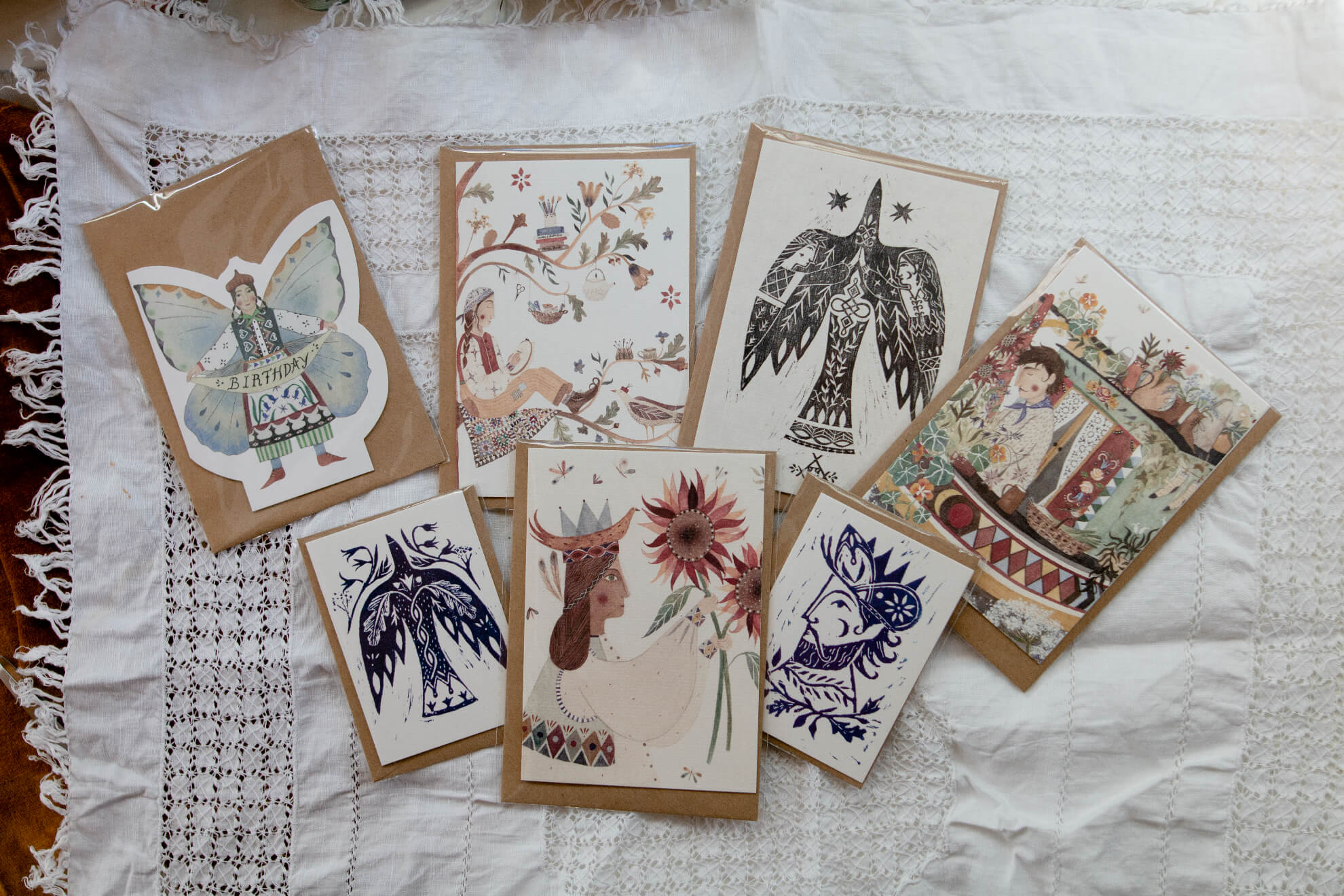 Folk inspired illustrated cards inside the bohemian studio of British illustrator and embroiderer Megan Ivy Griffiths