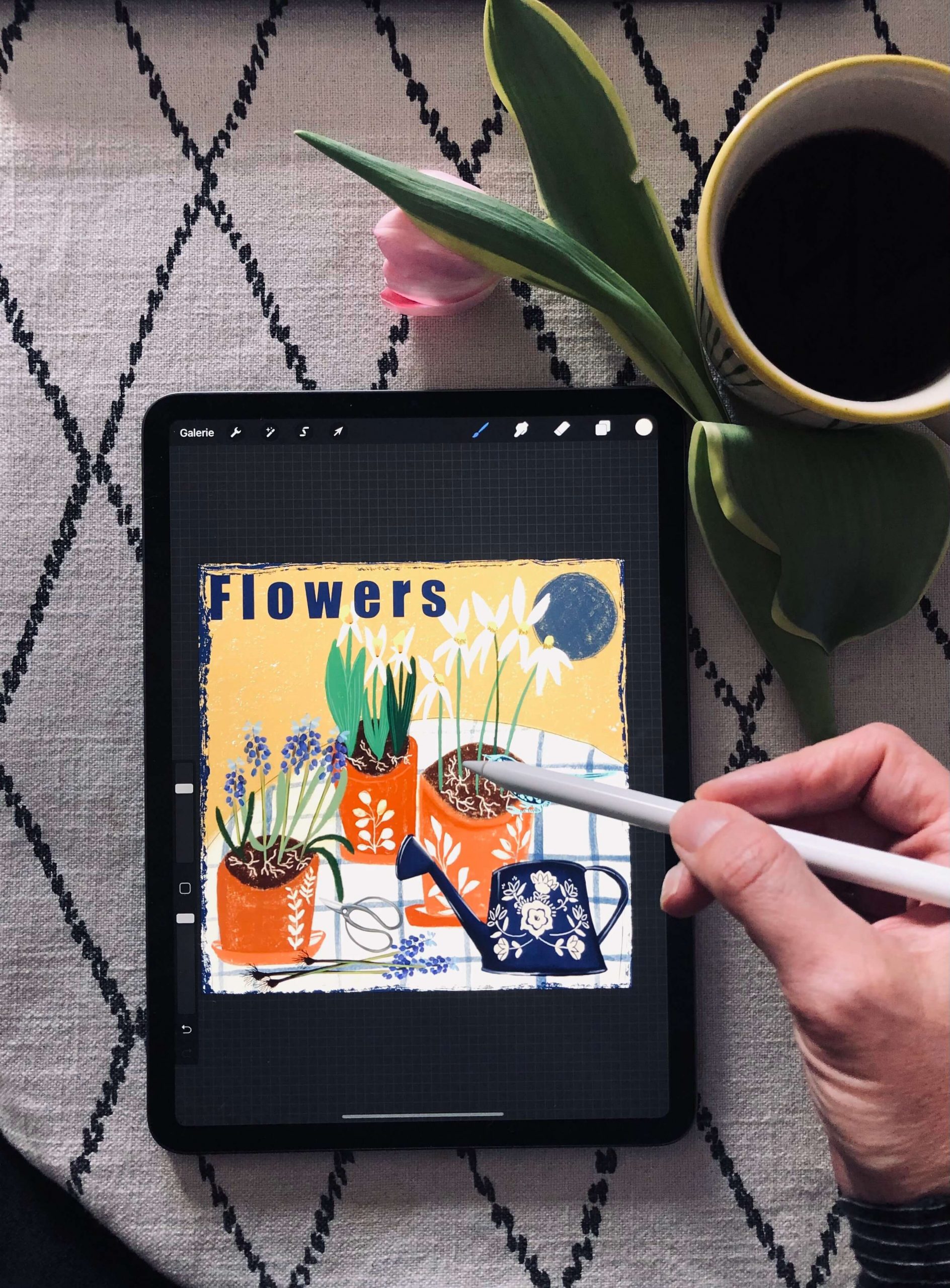 Illustrator and pattern designer Carole Hillman drawing flowers on iPad