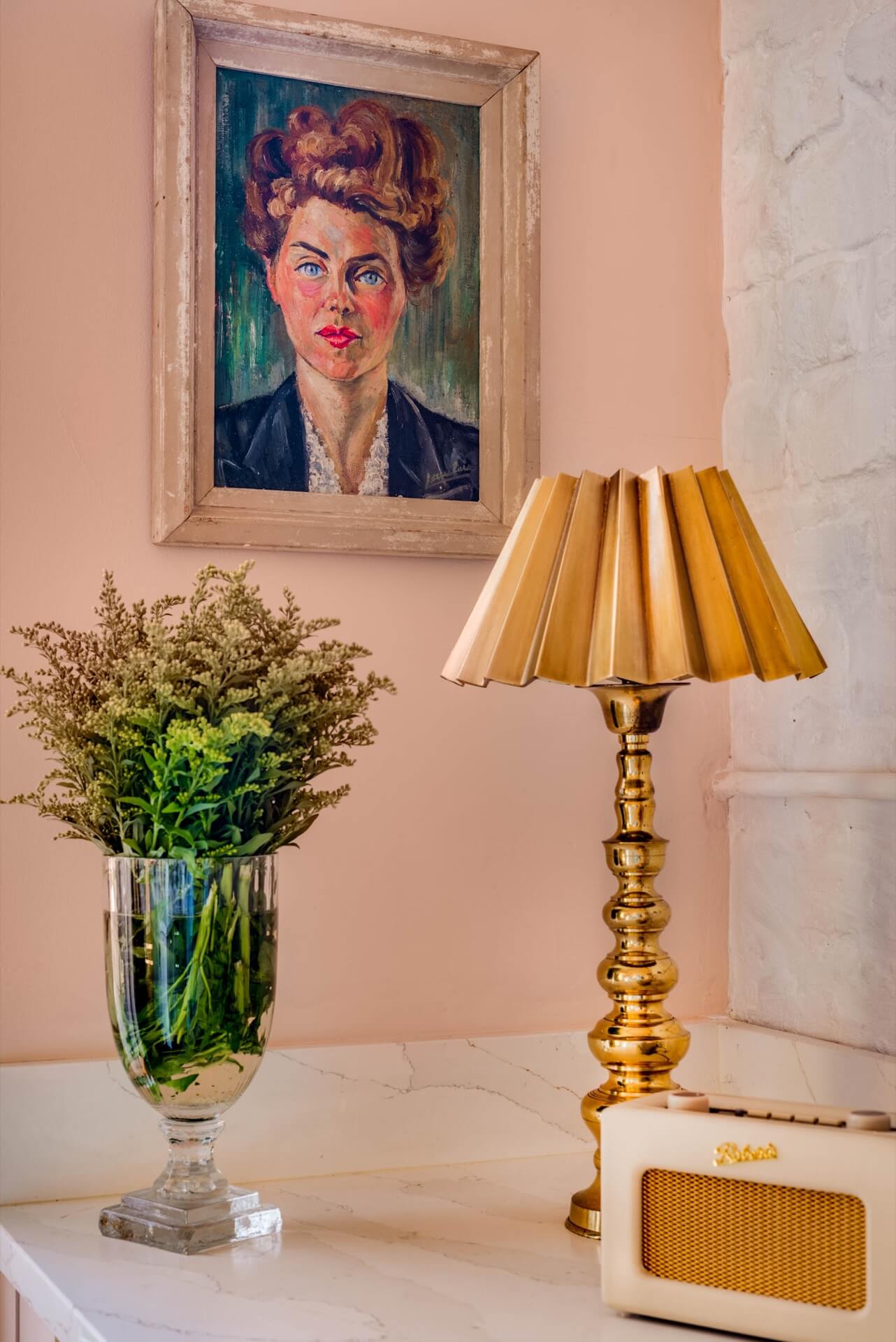 Vintage portrait painting and lamp in corner of Louise McCabe's home