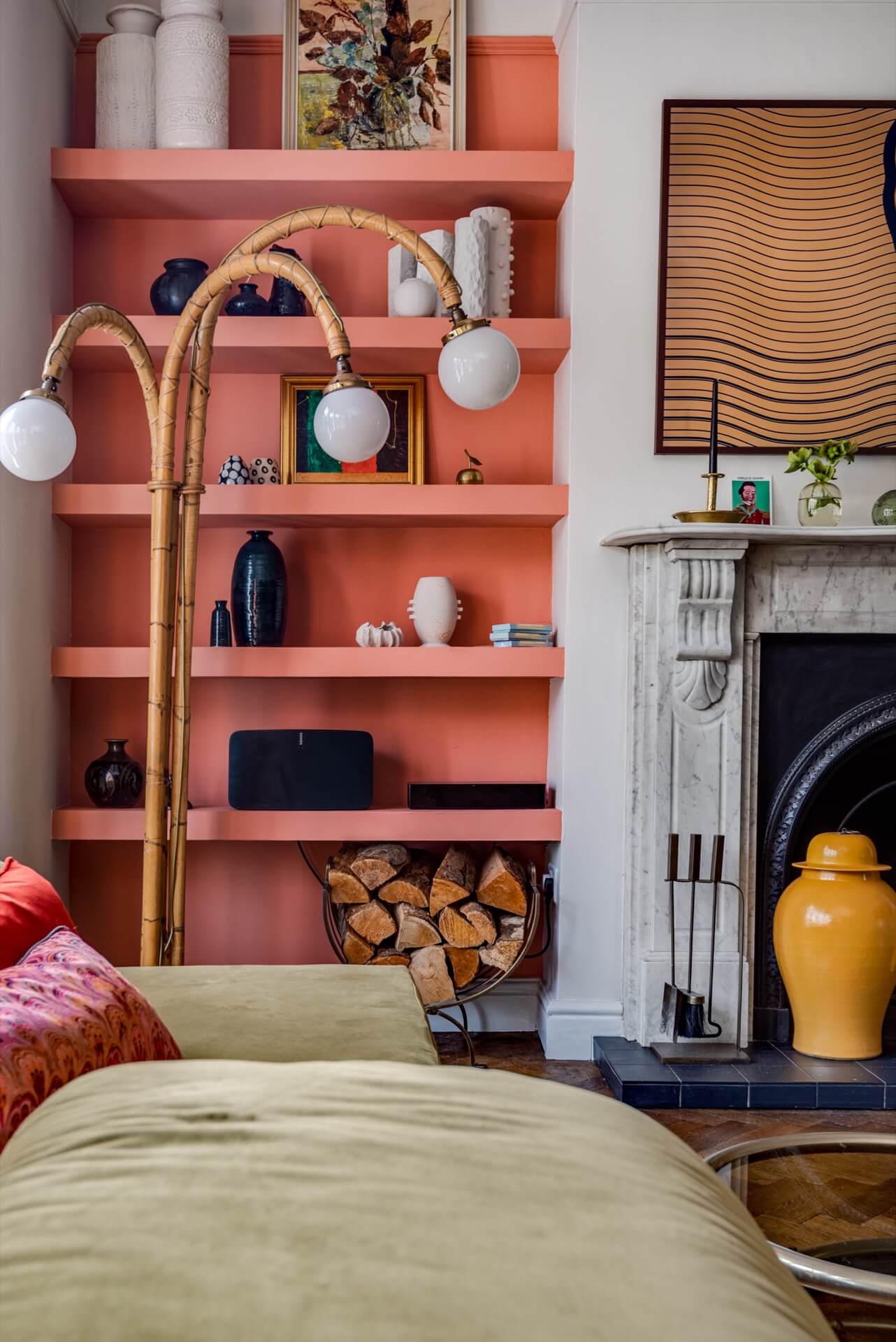 Living room with coral pink alcove shelving