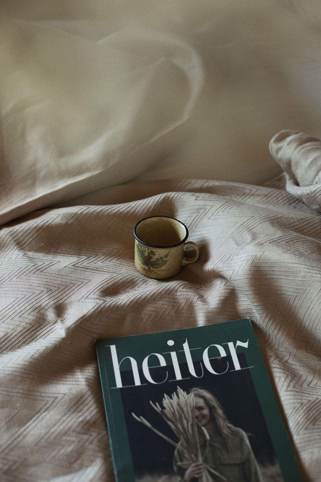 independent magazine Heiter on a bed