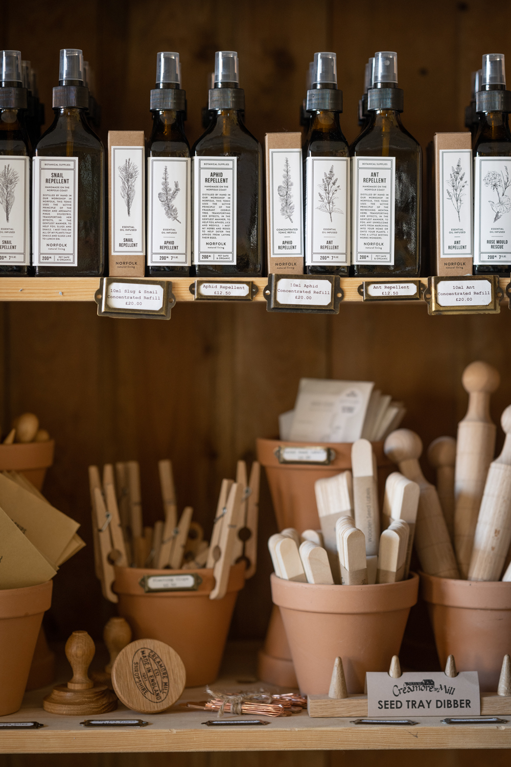 Garden pots, garden fragrance products and garden tools inside Norfolk Natural Living's Gardener's shop, Holt, Norfolk