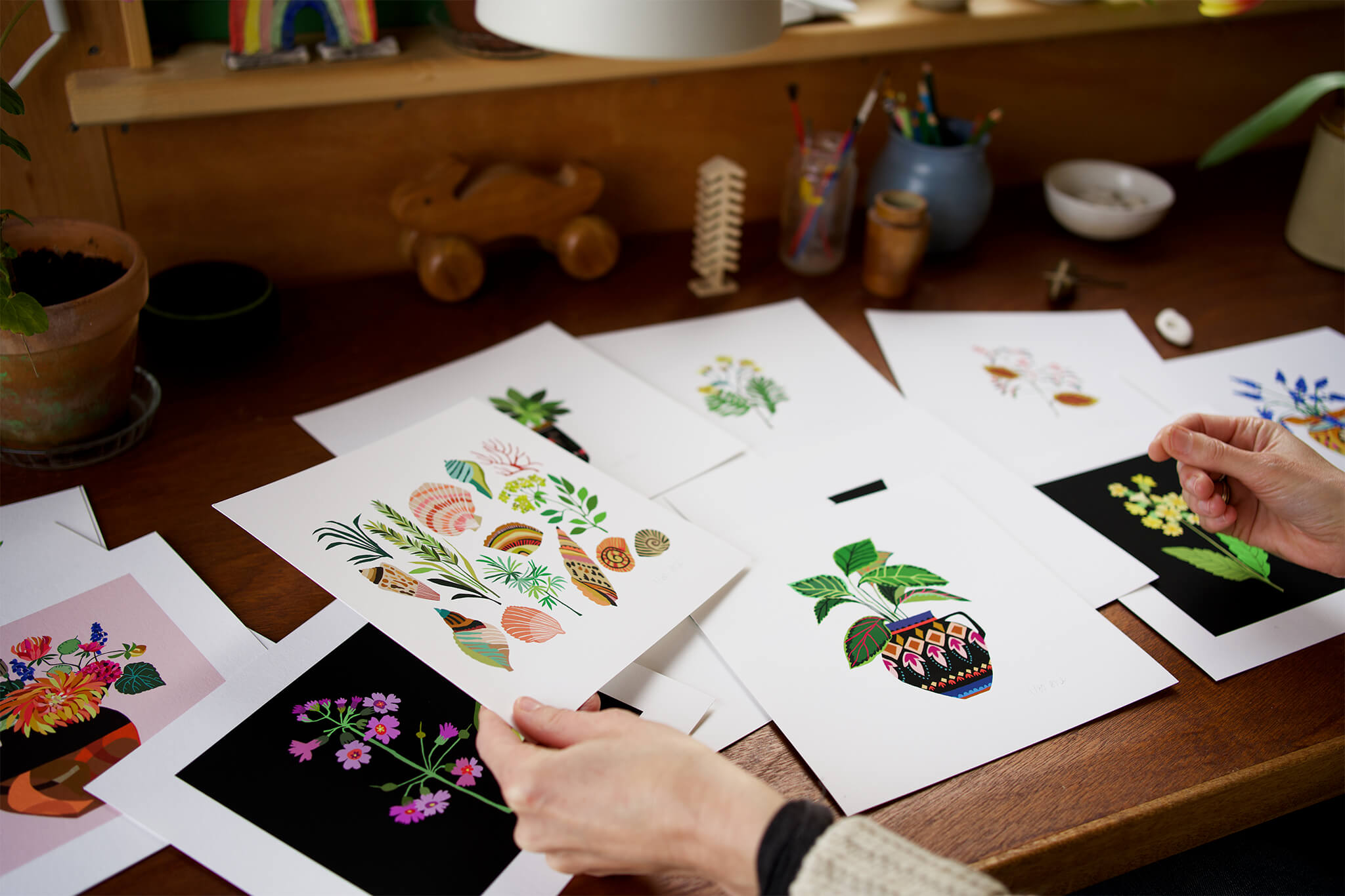 Flower and nature prints inside British illustrator Brie Harrison's wooden studio
