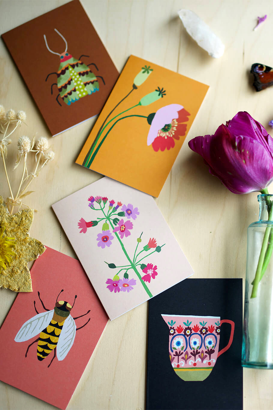 Flower and plant print cards inside British illustrator Brie Harrison's wooden studio