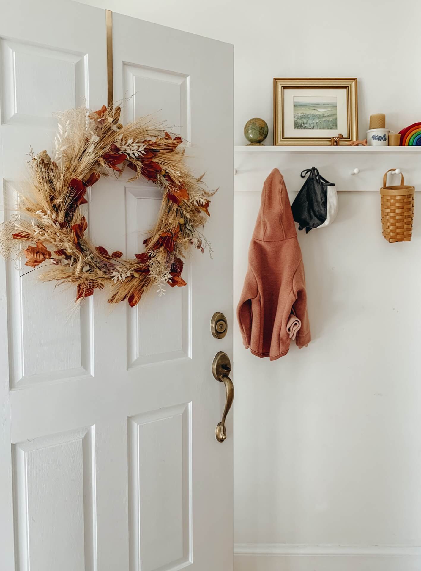 Home tour with Leah Gaeddert - a dried flower wreath hangs on a door