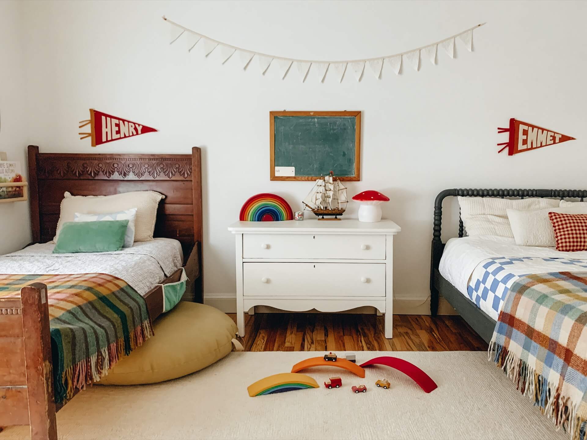 Home tour with Leah Gaeddert - childs bedroom decorated with vintage furniture and colourful wooden toyd