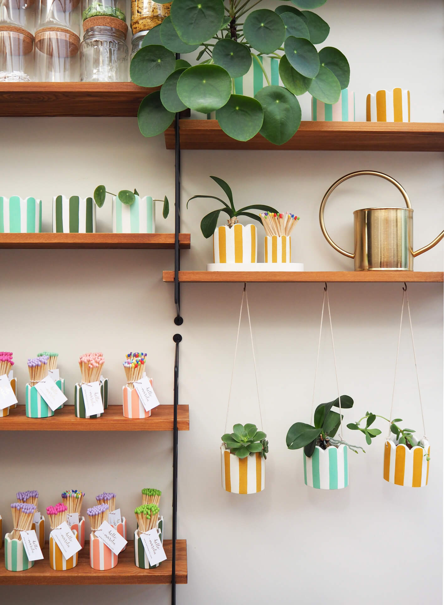 Stripey match pots and plant pots inside independent maker Hello Marilu's home studio